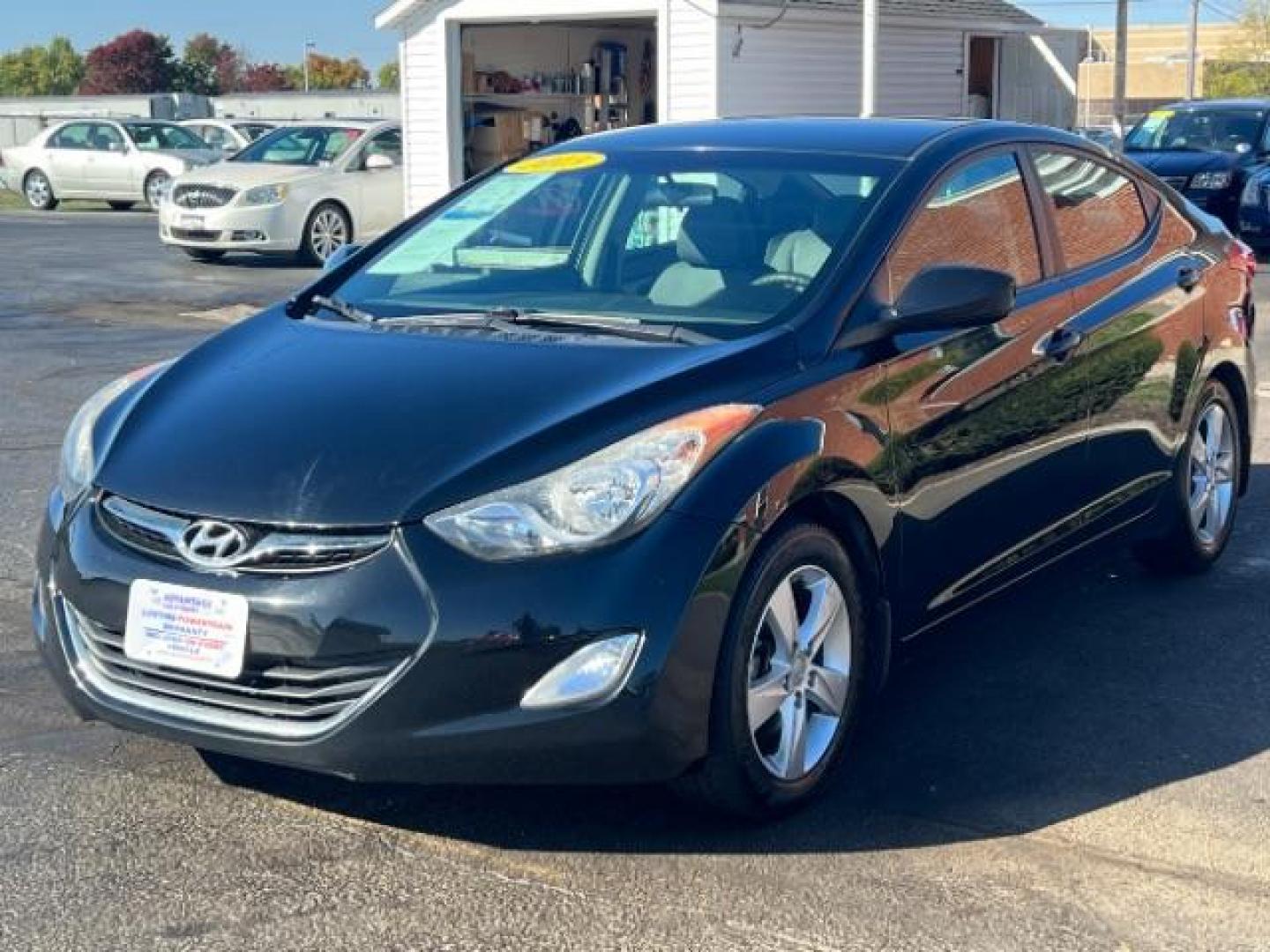 2013 Midnight Black Metallic Hyundai Elantra Limited (5NPDH4AE7DH) with an 1.8L L4 DOHC 16V engine, 6-Speed Automatic transmission, located at 1184 Kauffman Ave, Fairborn, OH, 45324, (937) 908-9800, 39.807072, -84.030914 - Photo#2