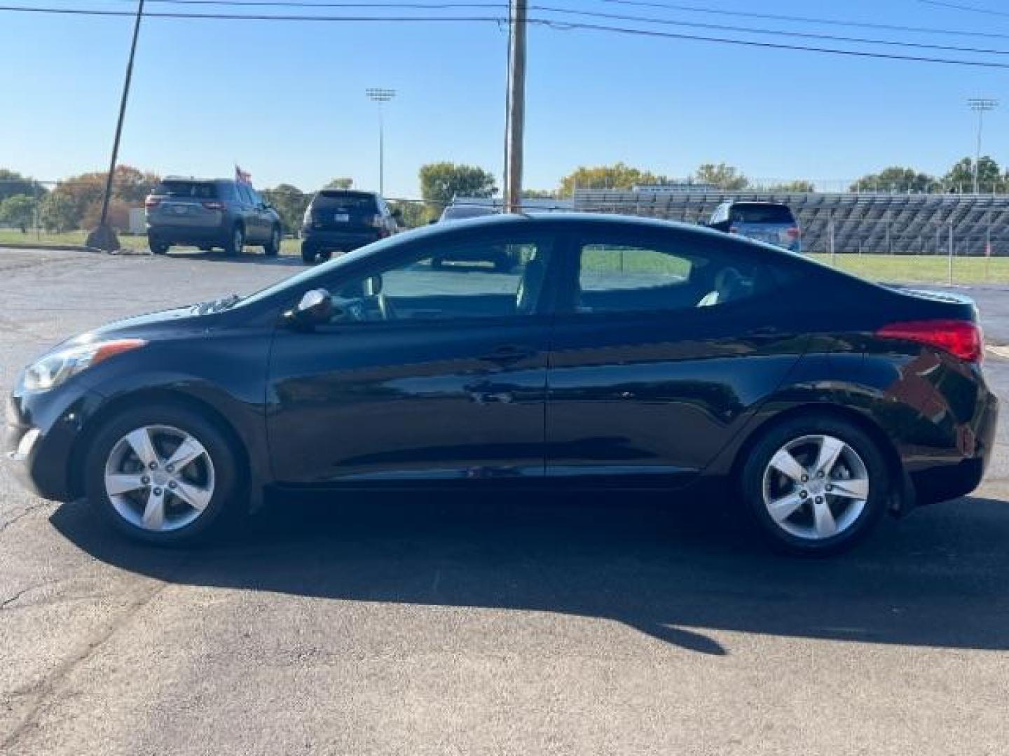 2013 Midnight Black Metallic Hyundai Elantra Limited (5NPDH4AE7DH) with an 1.8L L4 DOHC 16V engine, 6-Speed Automatic transmission, located at 1184 Kauffman Ave, Fairborn, OH, 45324, (937) 908-9800, 39.807072, -84.030914 - Photo#3