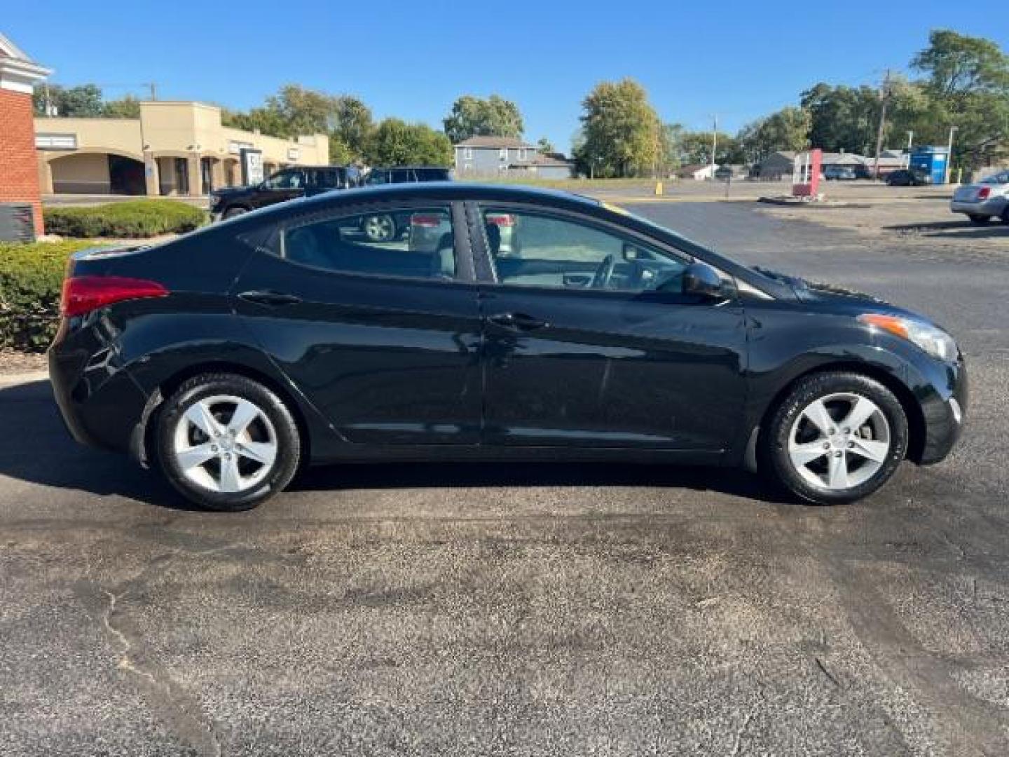 2013 Midnight Black Metallic Hyundai Elantra Limited (5NPDH4AE7DH) with an 1.8L L4 DOHC 16V engine, 6-Speed Automatic transmission, located at 1184 Kauffman Ave, Fairborn, OH, 45324, (937) 908-9800, 39.807072, -84.030914 - Photo#5