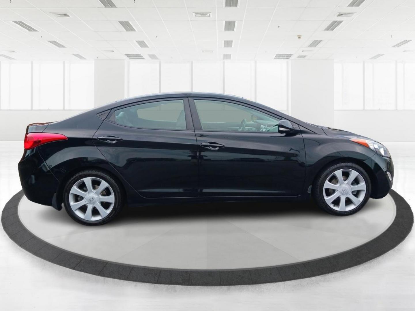 2013 Midnight Black Metallic Hyundai Elantra (5NPDH4AE0DH) with an 1.8L L4 DOHC 16V engine, 6-Speed Automatic transmission, located at 4508 South Dixie Dr, Moraine, OH, 45439, (937) 908-9800, 39.689976, -84.218452 - Photo#1