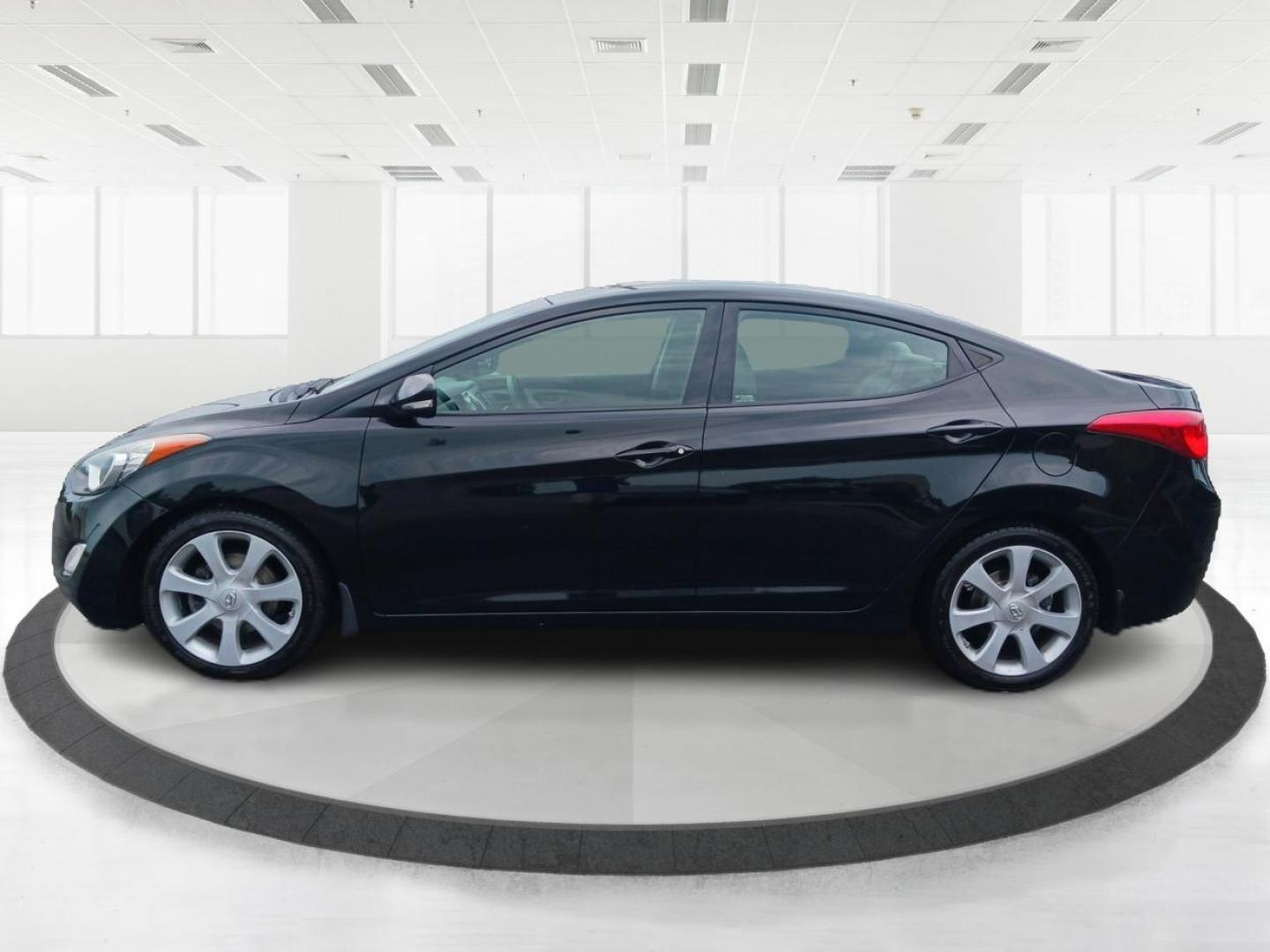 2013 Midnight Black Metallic Hyundai Elantra (5NPDH4AE0DH) with an 1.8L L4 DOHC 16V engine, 6-Speed Automatic transmission, located at 4508 South Dixie Dr, Moraine, OH, 45439, (937) 908-9800, 39.689976, -84.218452 - Photo#5