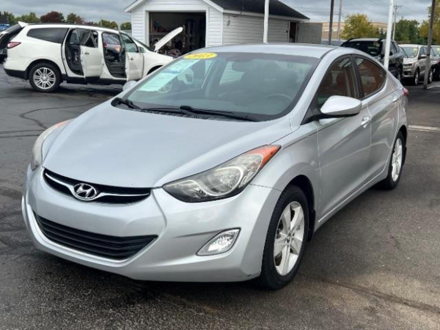 2013 Radiant Silver Metallic Hyundai Elantra GLS A/T (KMHDH4AE5DU) with an 1.8L L4 DOHC 16V engine, 6-Speed Automatic transmission, located at 401 Woodman Dr, Riverside, OH, 45431, (937) 908-9800, 39.760899, -84.123421 - Photo#2