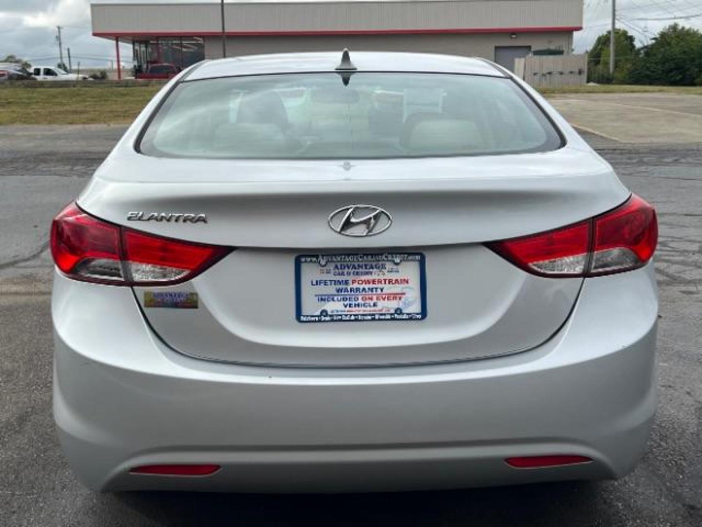 2013 Radiant Silver Metallic Hyundai Elantra GLS A/T (KMHDH4AE5DU) with an 1.8L L4 DOHC 16V engine, 6-Speed Automatic transmission, located at 401 Woodman Dr, Riverside, OH, 45431, (937) 908-9800, 39.760899, -84.123421 - Photo#4