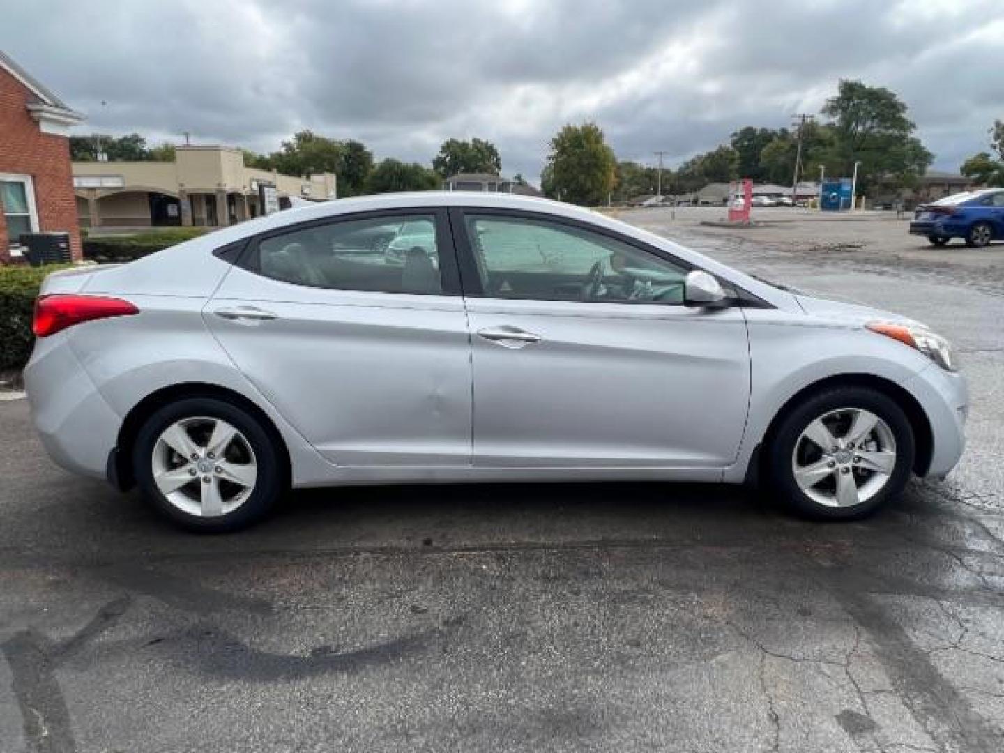 2013 Radiant Silver Metallic Hyundai Elantra GLS A/T (KMHDH4AE5DU) with an 1.8L L4 DOHC 16V engine, 6-Speed Automatic transmission, located at 401 Woodman Dr, Riverside, OH, 45431, (937) 908-9800, 39.760899, -84.123421 - Photo#5