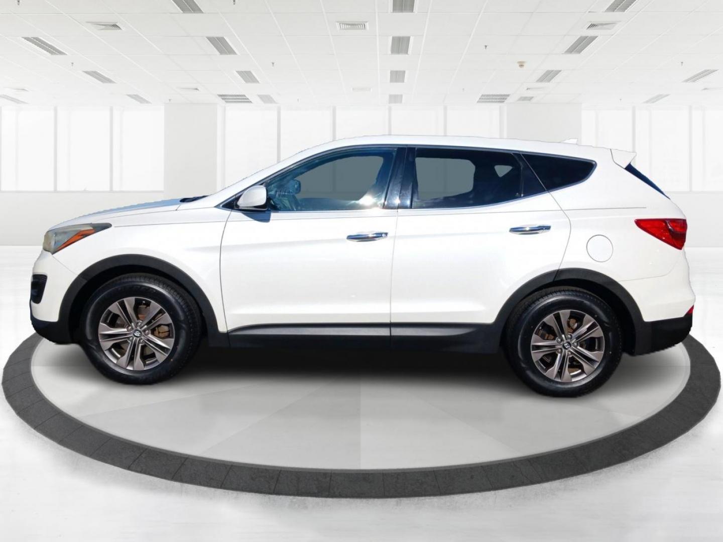 2013 Frost White Pearl Hyundai Santa Fe (5XYZTDLB7DG) with an 2.4L L4 DOHC 16V engine, 6-Speed Automatic transmission, located at 880 E. National Road, Vandalia, OH, 45377, (937) 908-9800, 39.891918, -84.183594 - Photo#5