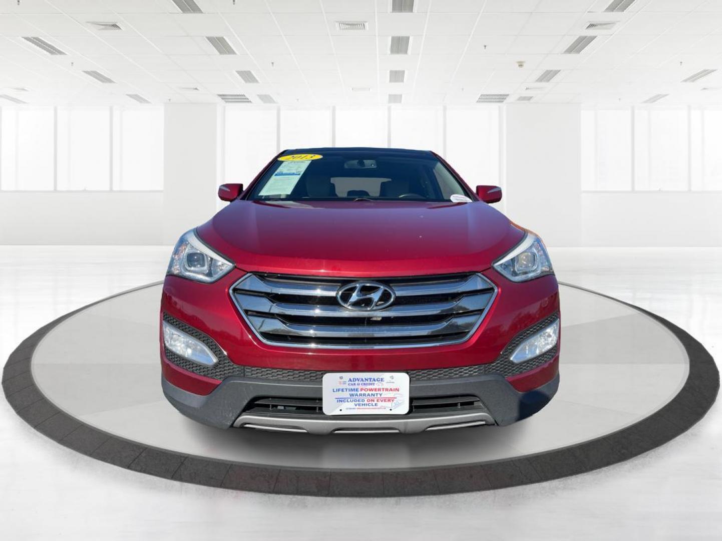 2013 Hyundai Santa Fe Sport 2.4 AWD (5XYZUDLB9DG) with an 2.4L L4 DOHC 16V engine, 6-Speed Automatic transmission, located at 4508 South Dixie Dr, Moraine, OH, 45439, (937) 908-9800, 39.689976, -84.218452 - 2013 Hyundai Santa Fe Sport 2.4 AWD - Photo#6