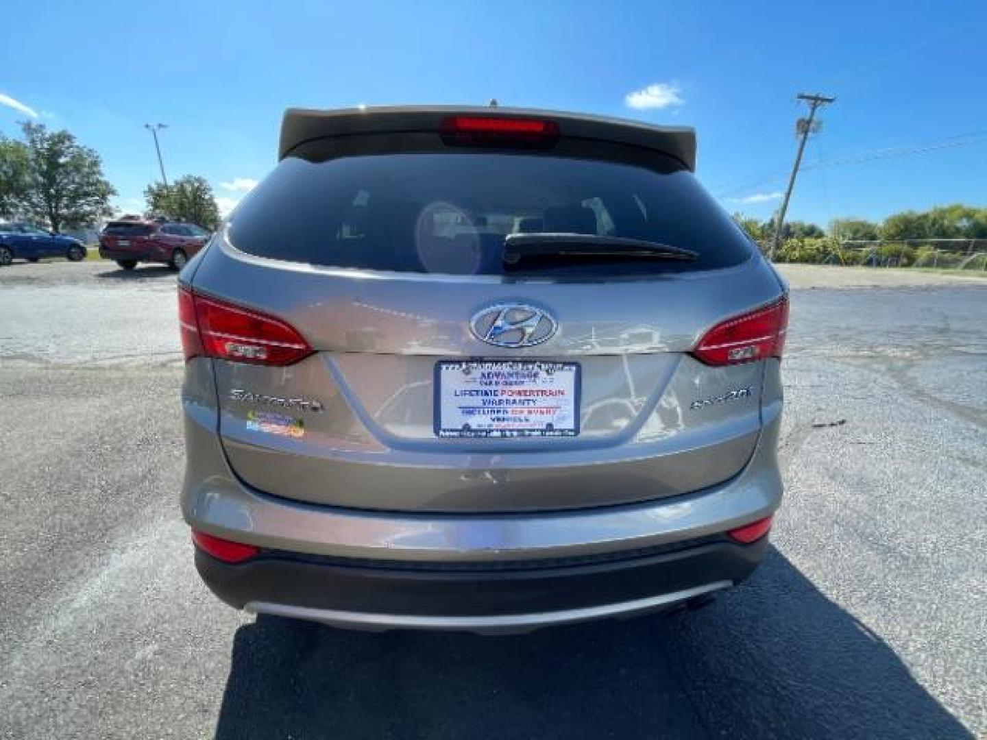 2013 Mineral Gray Hyundai Santa Fe Sport 2.0 FWD (5XYZU3LA8DG) with an 2.0L L4 DOHC 16V engine, 6-Speed Automatic transmission, located at 1184 Kauffman Ave, Fairborn, OH, 45324, (937) 908-9800, 39.807072, -84.030914 - Photo#3