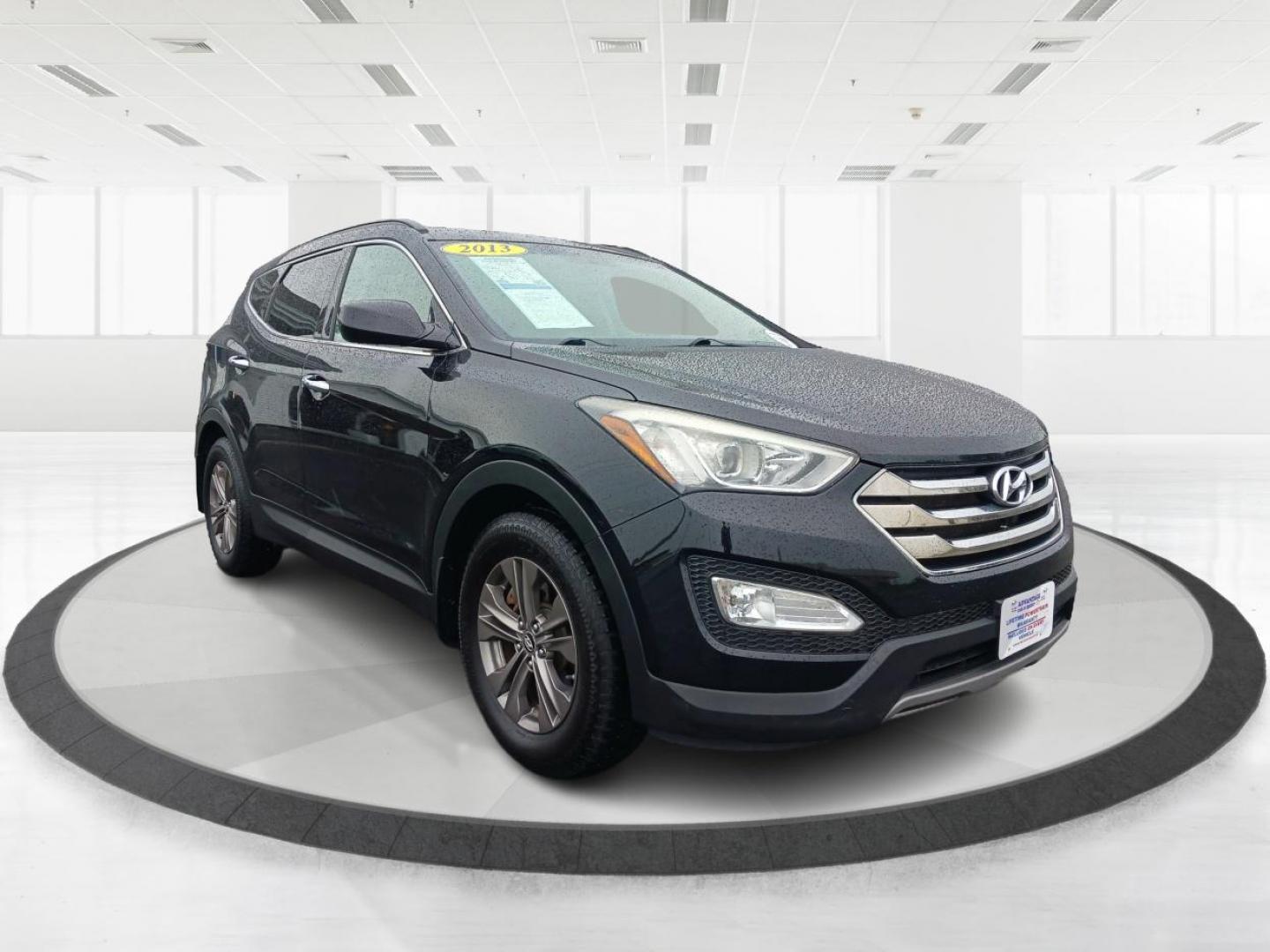 2013 Twilight Black Hyundai Santa Fe Sport 2.4 AWD (5XYZUDLB5DG) with an 2.4L L4 DOHC 16V engine, 6-Speed Automatic transmission, located at 1951 S Dayton Lakeview Rd., New Carlisle, OH, 45344, (937) 908-9800, 39.890999, -84.050255 - Photo#0