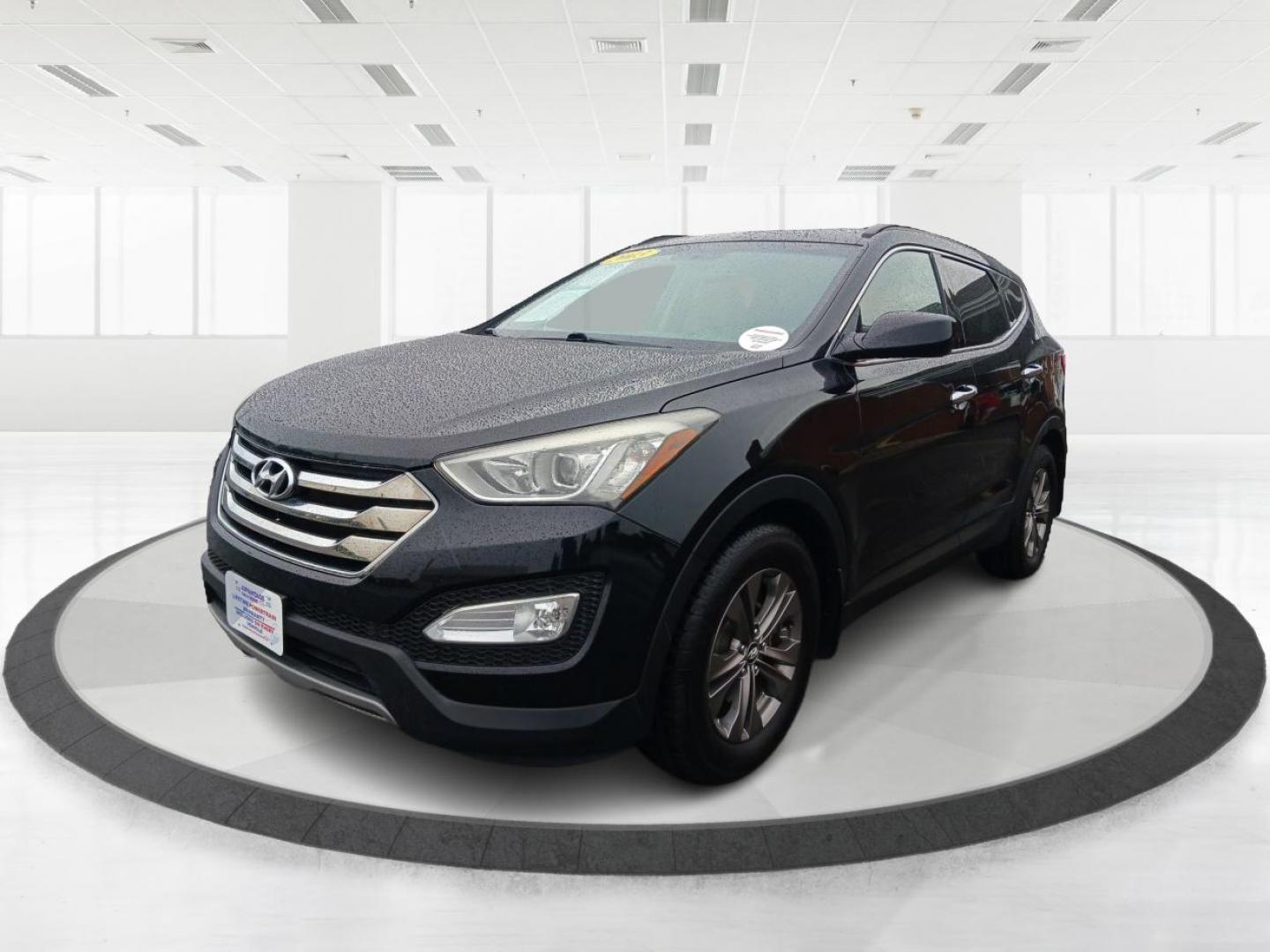 2013 Twilight Black Hyundai Santa Fe (5XYZUDLB5DG) with an 2.4L L4 DOHC 16V engine, 6-Speed Automatic transmission, located at 1951 S Dayton Lakeview Rd., New Carlisle, OH, 45344, (937) 908-9800, 39.890999, -84.050255 - Photo#7