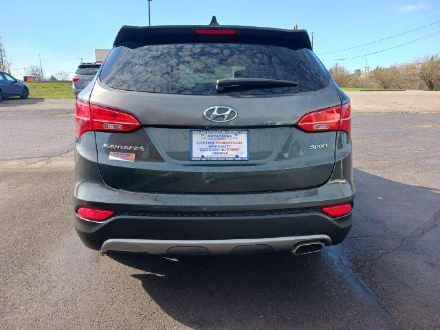 2013 Hyundai Santa Fe Sport 2.4 FWD (5XYZU3LB8DG) with an 2.4L L4 DOHC 16V engine, 6-Speed Automatic transmission, located at 1951 S Dayton Lakeview Rd., New Carlisle, OH, 45344, (937) 908-9800, 39.890999, -84.050255 - 2013 Hyundai Santa Fe Sport 2.4 FWD - Photo#5