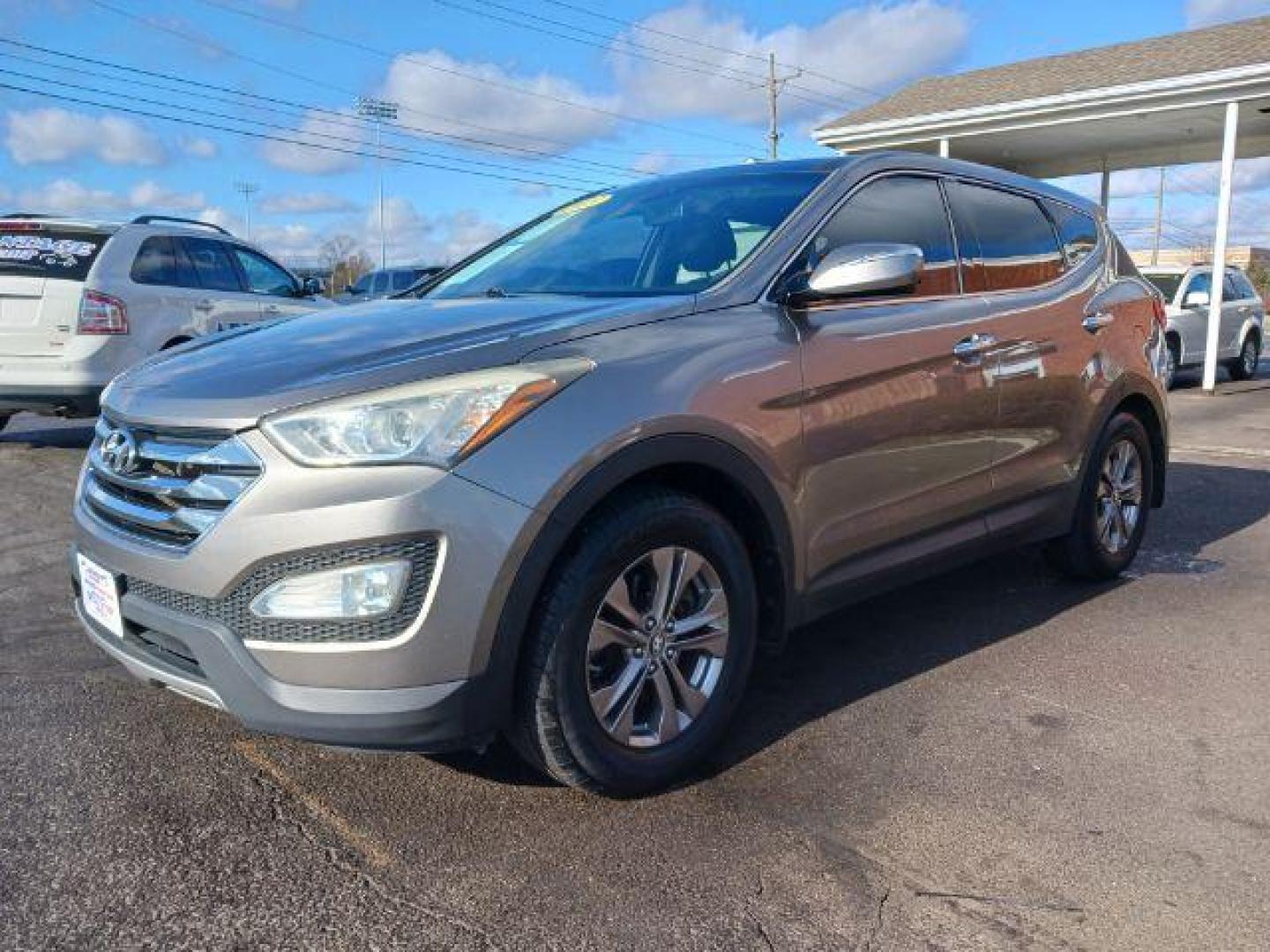 2013 Mineral Gray Hyundai Santa Fe Sport 2.4 AWD (5XYZUDLBXDG) with an 2.4L L4 DOHC 16V engine, 6-Speed Automatic transmission, located at 1184 Kauffman Ave, Fairborn, OH, 45324, (937) 908-9800, 39.807072, -84.030914 - Photo#2