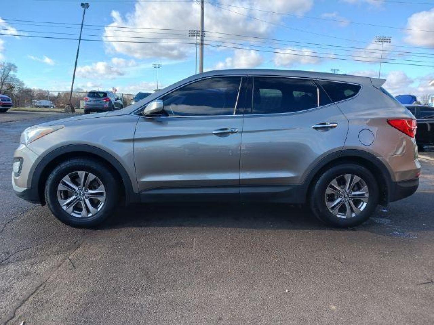 2013 Mineral Gray Hyundai Santa Fe Sport 2.4 AWD (5XYZUDLBXDG) with an 2.4L L4 DOHC 16V engine, 6-Speed Automatic transmission, located at 1184 Kauffman Ave, Fairborn, OH, 45324, (937) 908-9800, 39.807072, -84.030914 - Photo#3