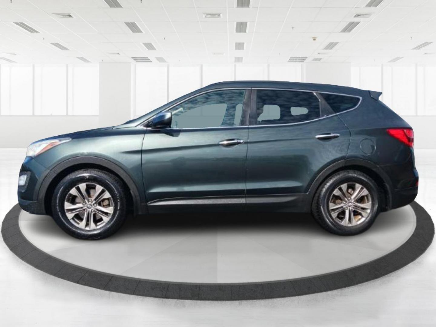 2013 Juniper Green Hyundai Santa Fe Sport 2.4 FWD (5XYZU3LB8DG) with an 2.4L L4 DOHC 16V engine, 6-Speed Automatic transmission, located at 1230 East Main St, Xenia, OH, 45385, (937) 908-9800, 39.688026, -83.910172 - Photo#7