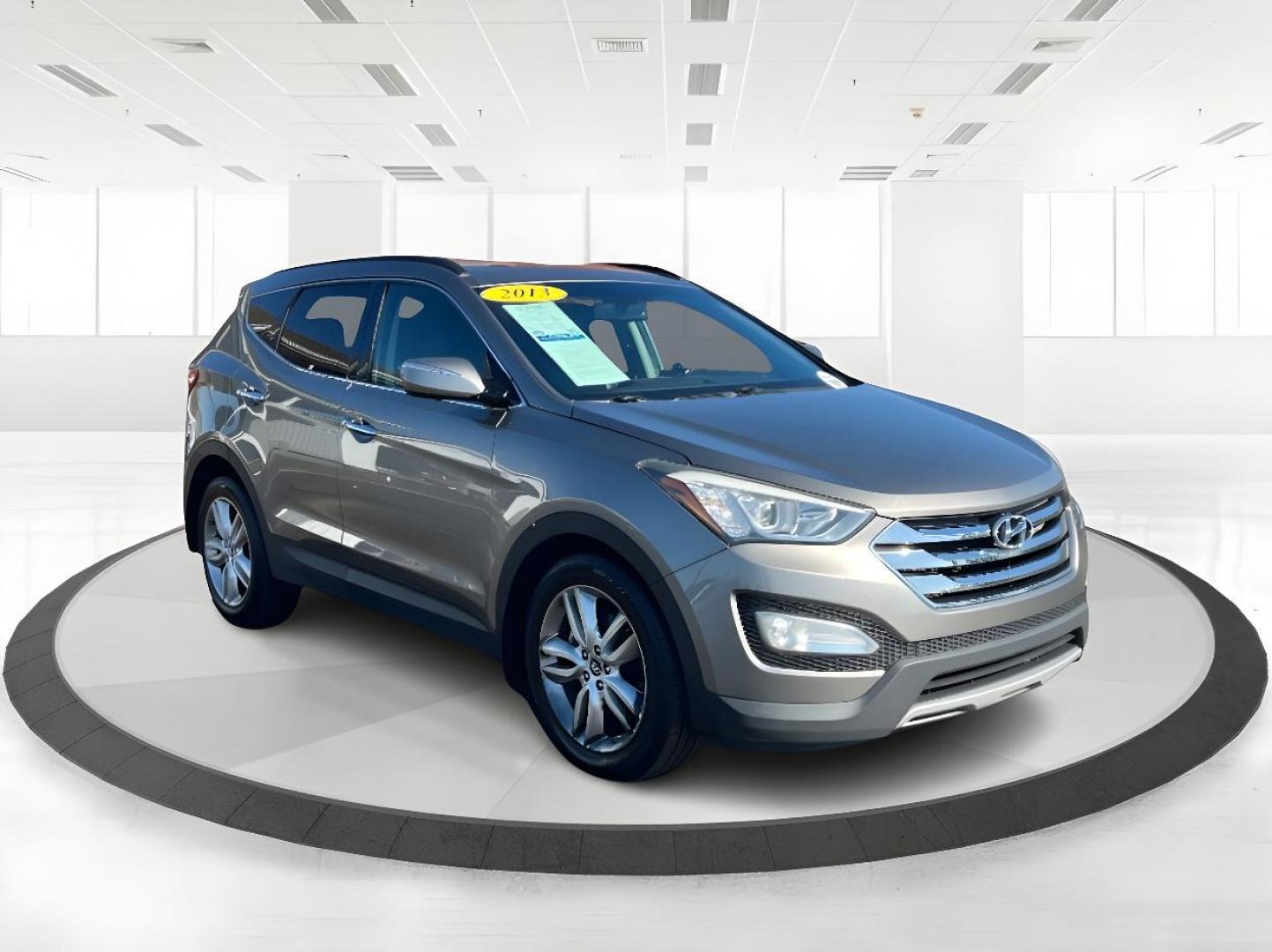 2013 Moonstone Silver Hyundai Santa Fe Sport 2.0 AWD (5XYZUDLAXDG) with an 2.0L L4 DOHC 16V engine, 6-Speed Automatic transmission, located at 1184 Kauffman Ave, Fairborn, OH, 45324, (937) 908-9800, 39.807072, -84.030914 - Photo#0