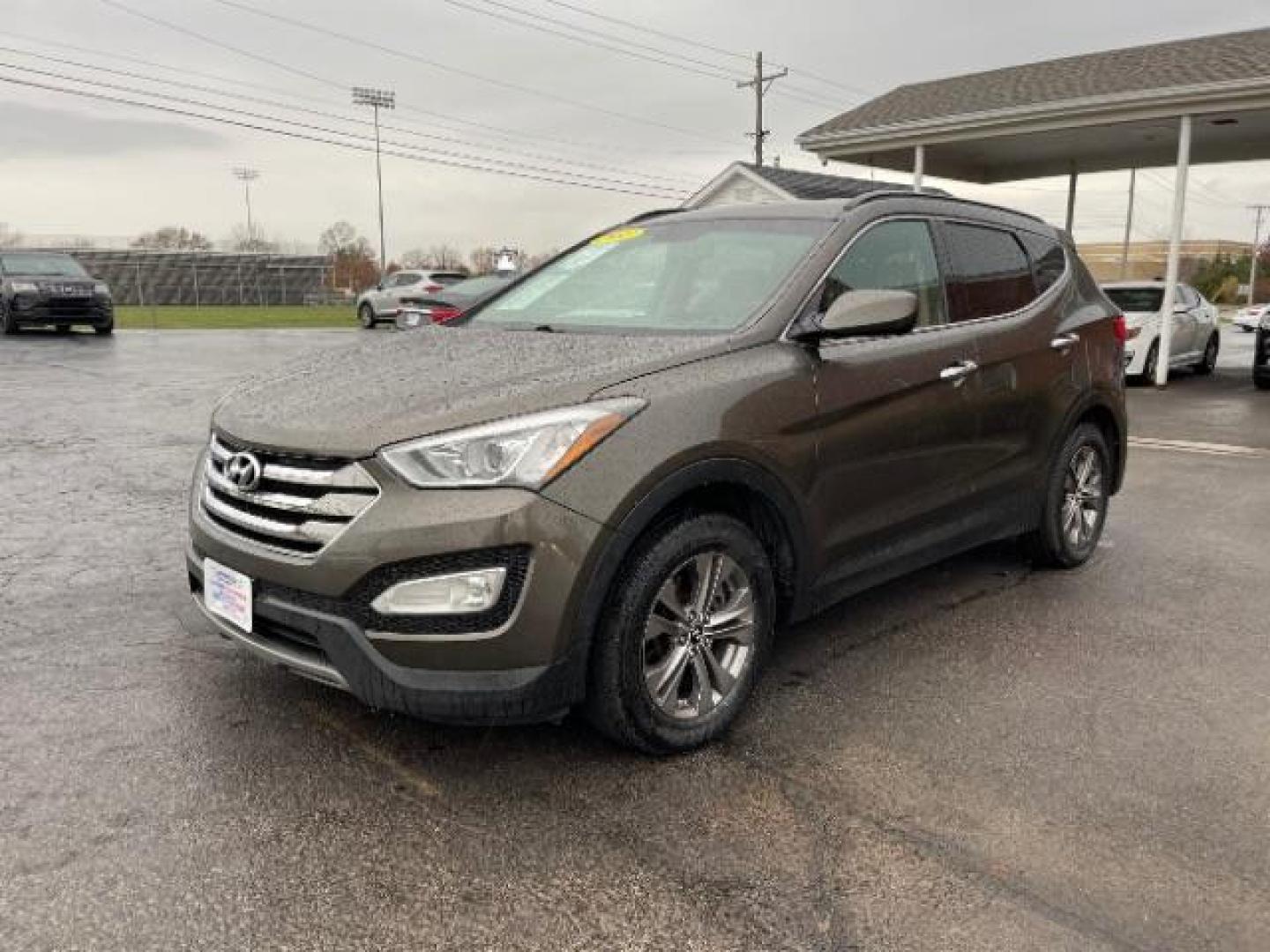 2013 Mineral Gray Hyundai Santa Fe Sport 2.4 AWD (5XYZUDLBXDG) with an 2.4L L4 DOHC 16V engine, 6-Speed Automatic transmission, located at 1230 East Main St, Xenia, OH, 45385, (937) 908-9800, 39.688026, -83.910172 - Photo#1