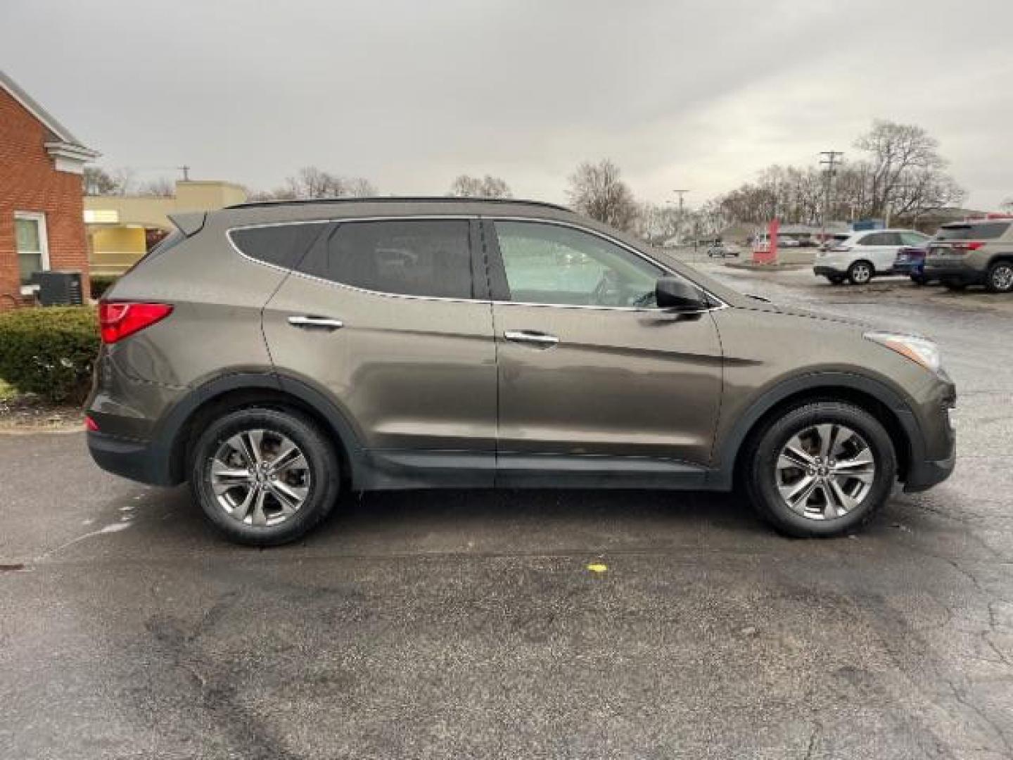 2013 Mineral Gray Hyundai Santa Fe Sport 2.4 AWD (5XYZUDLBXDG) with an 2.4L L4 DOHC 16V engine, 6-Speed Automatic transmission, located at 1230 East Main St, Xenia, OH, 45385, (937) 908-9800, 39.688026, -83.910172 - Photo#3