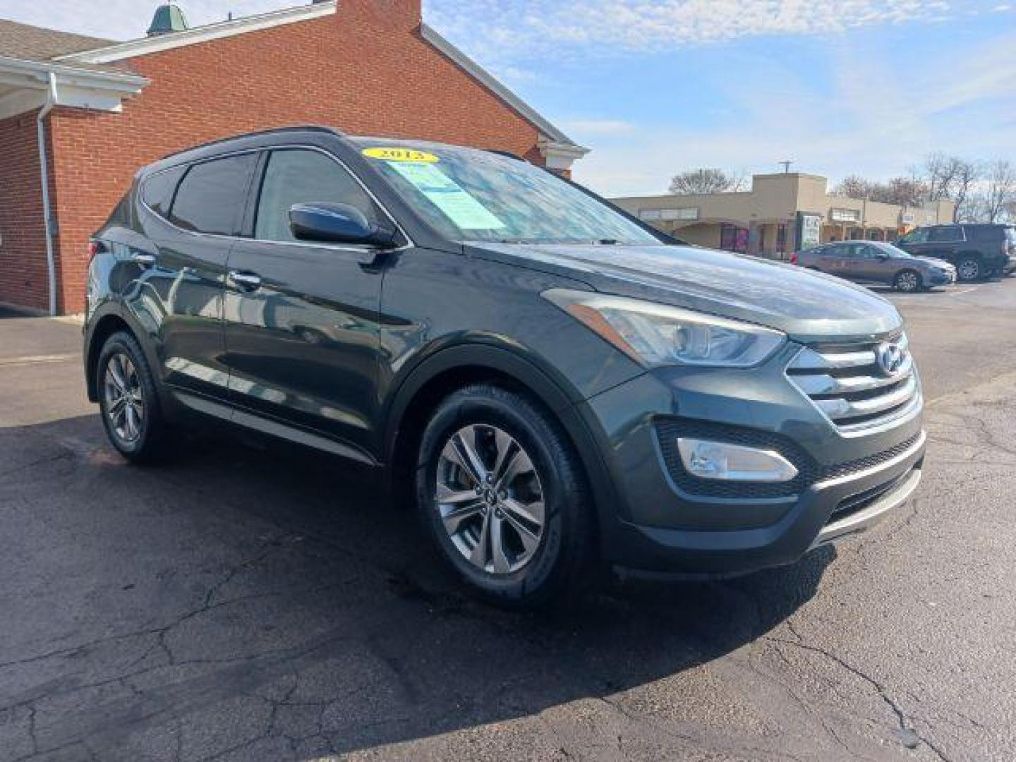 2013 Juniper Green Hyundai Santa Fe Sport 2.4 FWD (5XYZU3LB8DG) with an 2.4L L4 DOHC 16V engine, 6-Speed Automatic transmission, located at 1230 East Main St, Xenia, OH, 45385, (937) 908-9800, 39.688026, -83.910172 - Photo#0