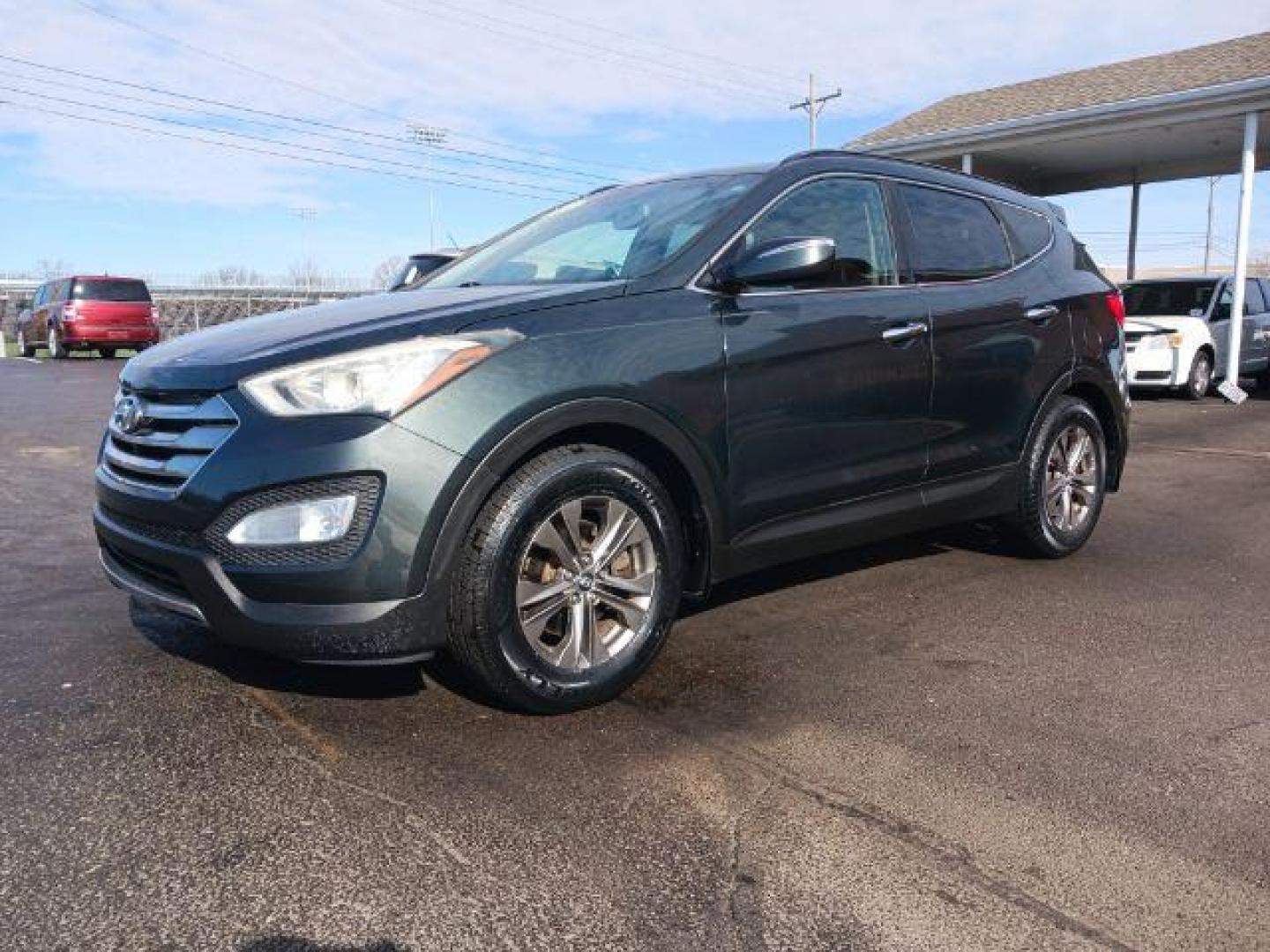 2013 Juniper Green Hyundai Santa Fe Sport 2.4 FWD (5XYZU3LB8DG) with an 2.4L L4 DOHC 16V engine, 6-Speed Automatic transmission, located at 1230 East Main St, Xenia, OH, 45385, (937) 908-9800, 39.688026, -83.910172 - Photo#4