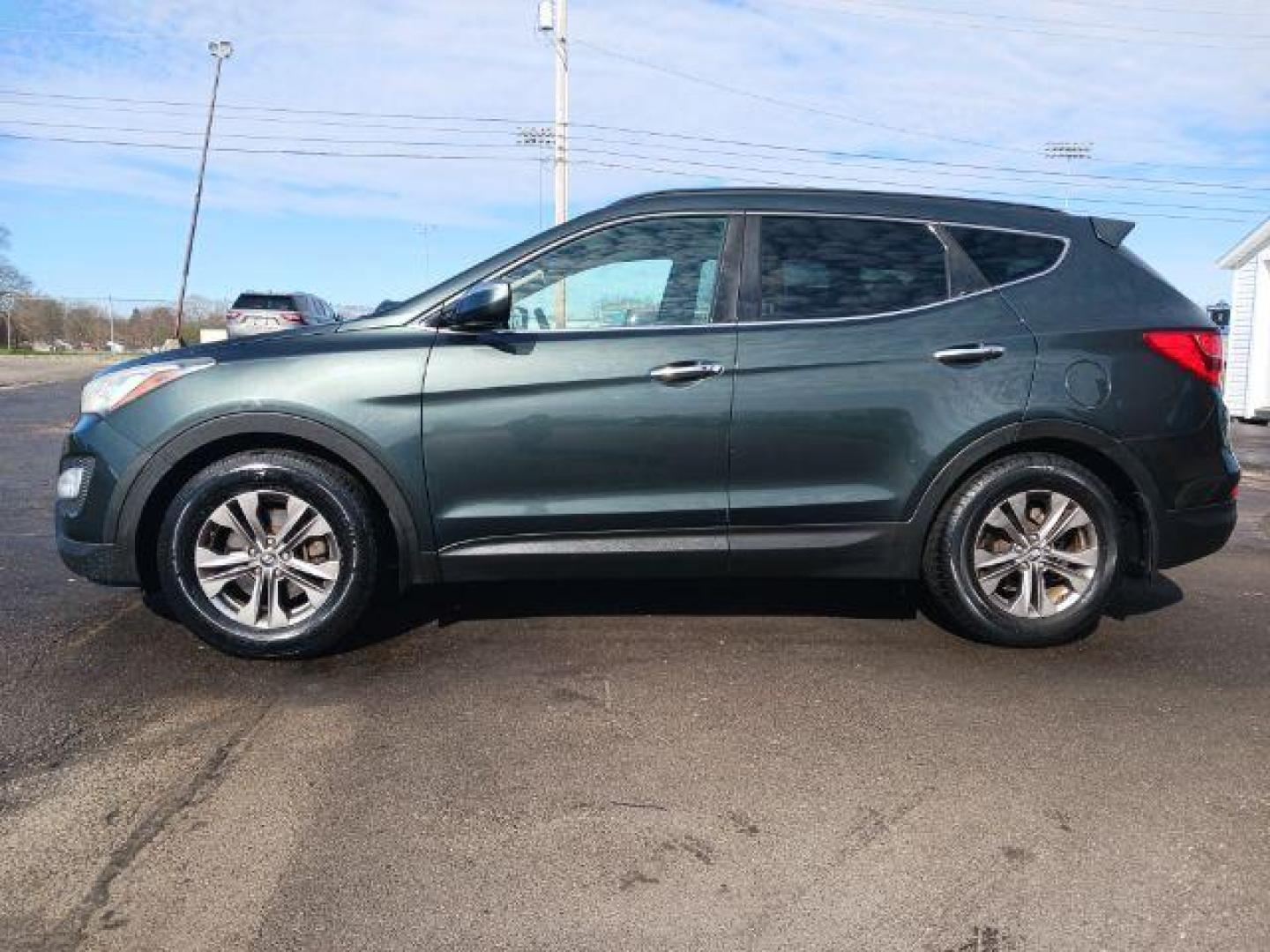 2013 Juniper Green Hyundai Santa Fe Sport 2.4 FWD (5XYZU3LB8DG) with an 2.4L L4 DOHC 16V engine, 6-Speed Automatic transmission, located at 1230 East Main St, Xenia, OH, 45385, (937) 908-9800, 39.688026, -83.910172 - Photo#6