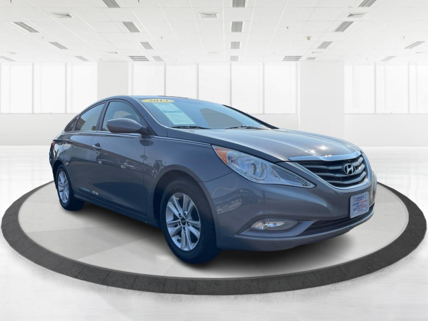 2013 Gray Hyundai Sonata (5NPEB4AC5DH) with an 2.4L L4 DOHC 16V engine, 6-Speed Automatic transmission, located at 880 E. National Road, Vandalia, OH, 45377, (937) 908-9800, 39.891918, -84.183594 - Photo#0