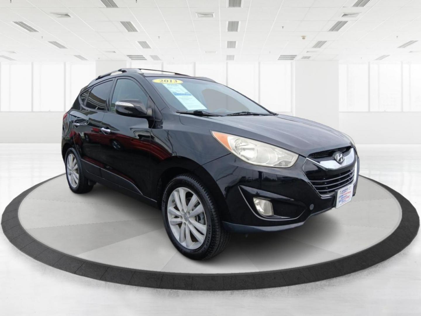 2013 Hyundai Tucson Limited 2WD (KM8JU3AC1DU) with an 2.4L L4 DOHC 16V engine, 6-Speed Automatic transmission, located at 1184 Kauffman Ave, Fairborn, OH, 45324, (937) 908-9800, 39.807072, -84.030914 - 2013 Hyundai Tucson Limited 2WD - Photo#0