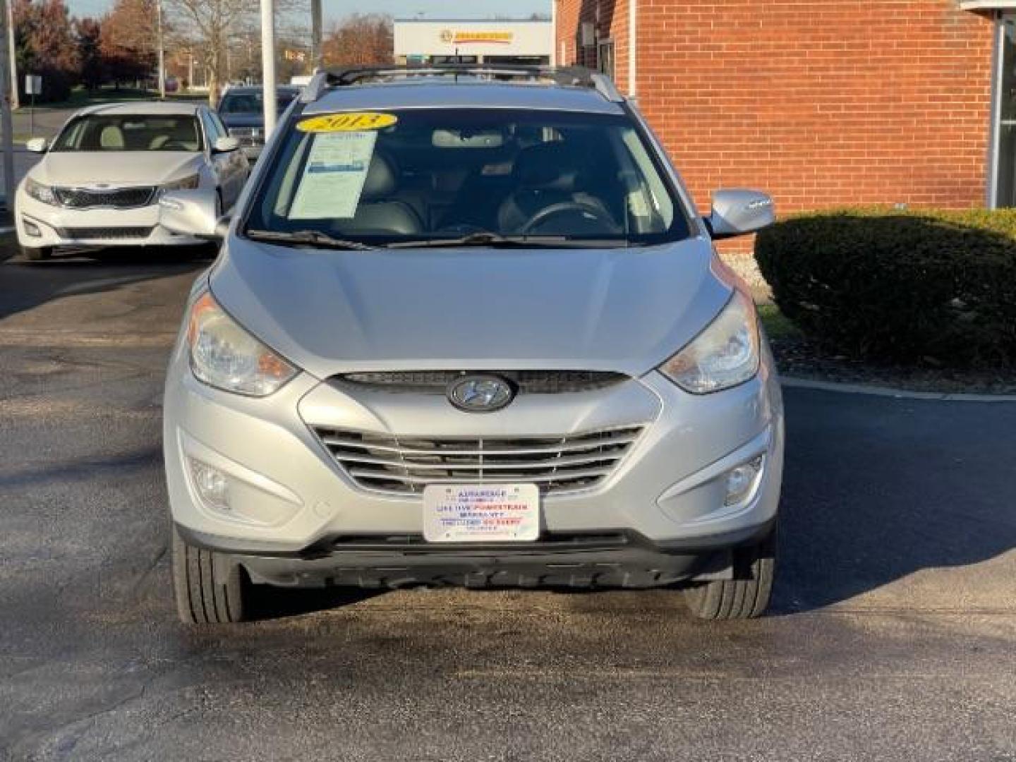 2013 Diamond Silver Metallic Hyundai Tucson GLS AWD (KM8JUCAC1DU) with an 2.4L L4 DOHC 16V engine, 6-Speed Automatic transmission, located at 1230 East Main St, Xenia, OH, 45385, (937) 908-9800, 39.688026, -83.910172 - Photo#5