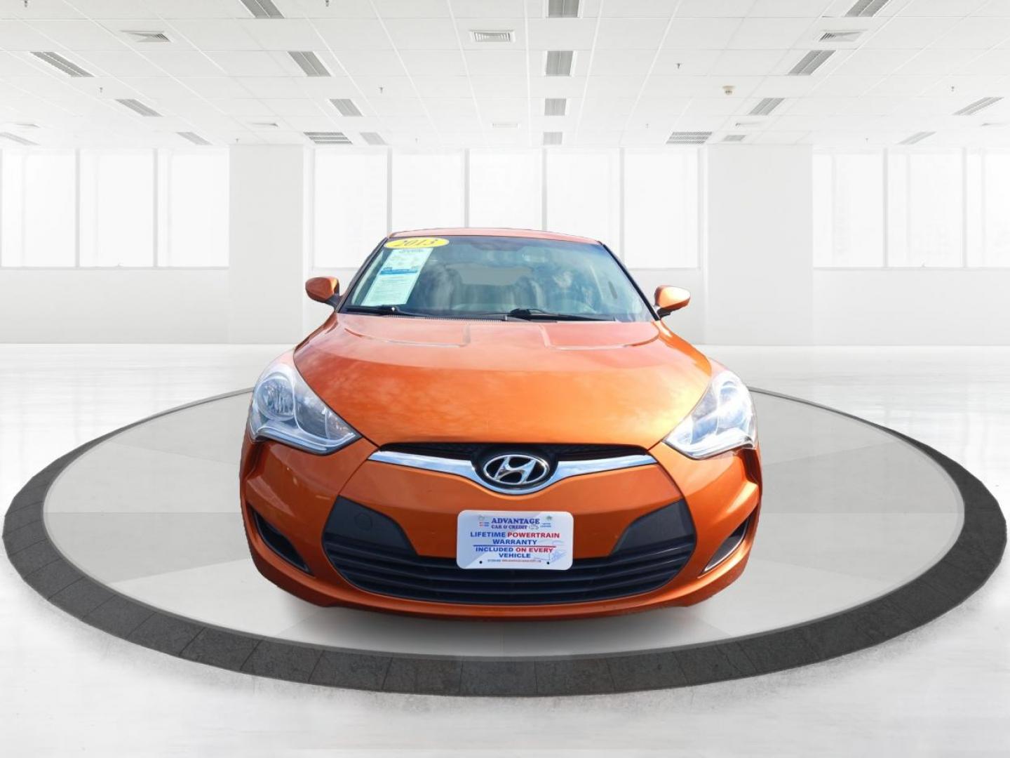 2013 Vitamin C Hyundai Veloster (KMHTC6AD8DU) with an 1.6L L4 DOHC 16V engine, located at 401 Woodman Dr, Riverside, OH, 45431, (937) 908-9800, 39.760899, -84.123421 - Photo#6