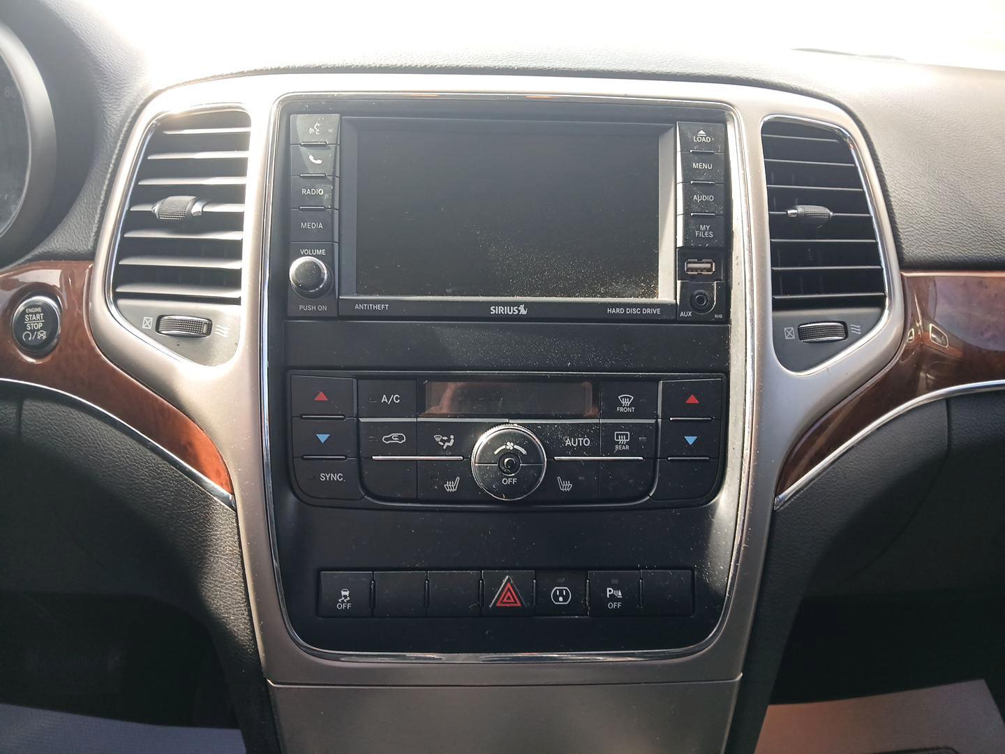 2013 Brilliant Black Crystal Pearl Jeep Grand Cherokee (1C4RJFBG1DC) with an 3.6L V6 DOHC 24V engine, 5-Speed Automatic transmission, located at 4508 South Dixie Dr, Moraine, OH, 45439, (937) 908-9800, 39.689976, -84.218452 - Photo#12