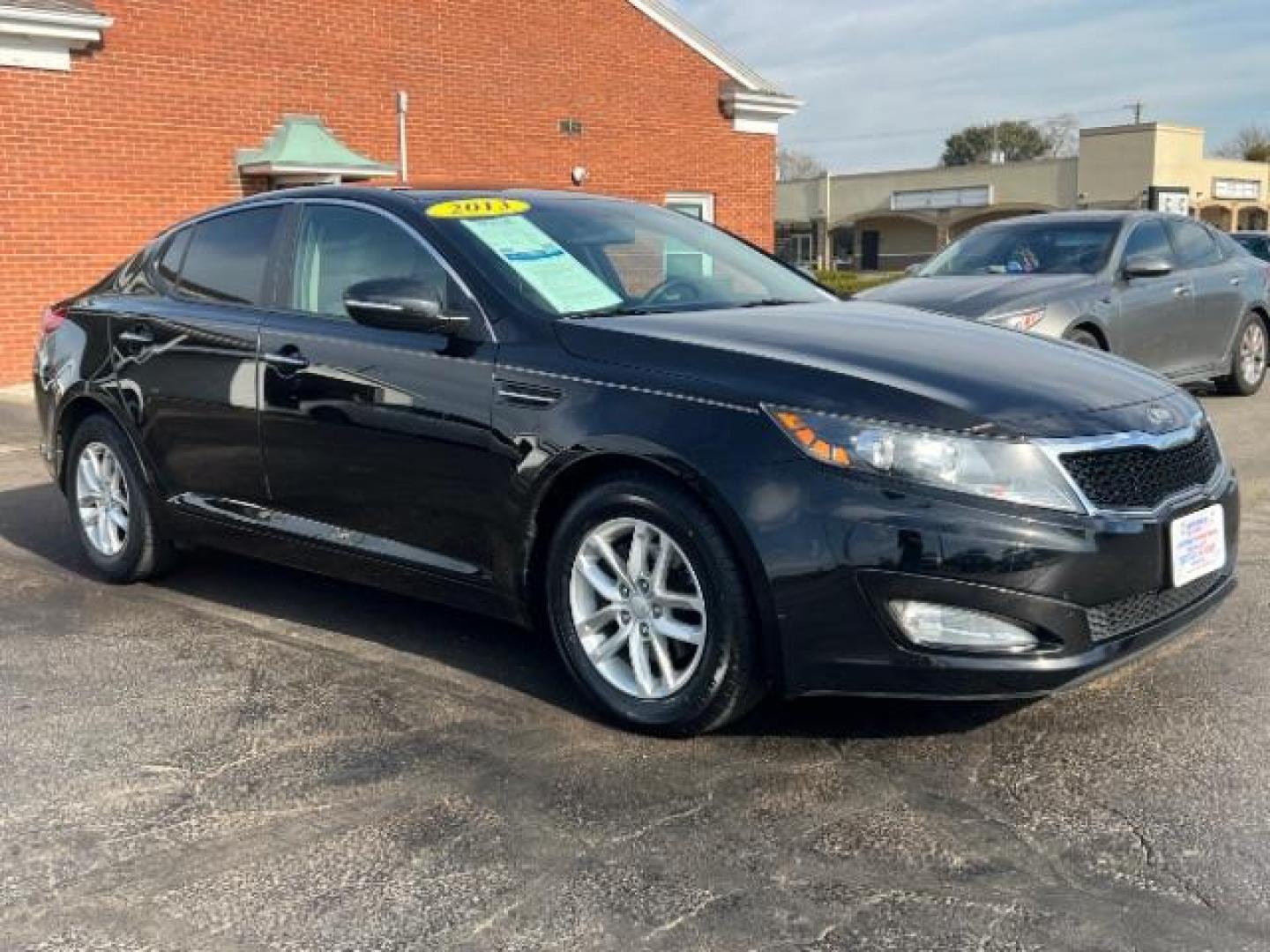 2013 Ebony Black Kia Optima LX AT (5XXGM4A7XDG) with an 2.4L L4 DOHC 16V engine, 6-Speed Automatic transmission, located at 1951 S Dayton Lakeview Rd., New Carlisle, OH, 45344, (937) 908-9800, 39.890999, -84.050255 - Photo#0