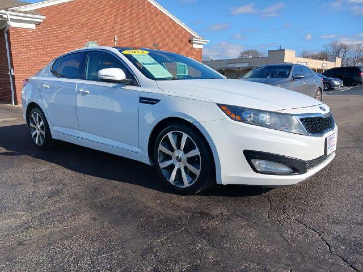 2013 Snow White Pearl Kia Optima EX (5XXGN4A7XDG) with an 2.4L L4 DOHC 16V engine, 6-Speed Automatic transmission, located at 401 Woodman Dr, Riverside, OH, 45431, (937) 908-9800, 39.760899, -84.123421 - Photo#0