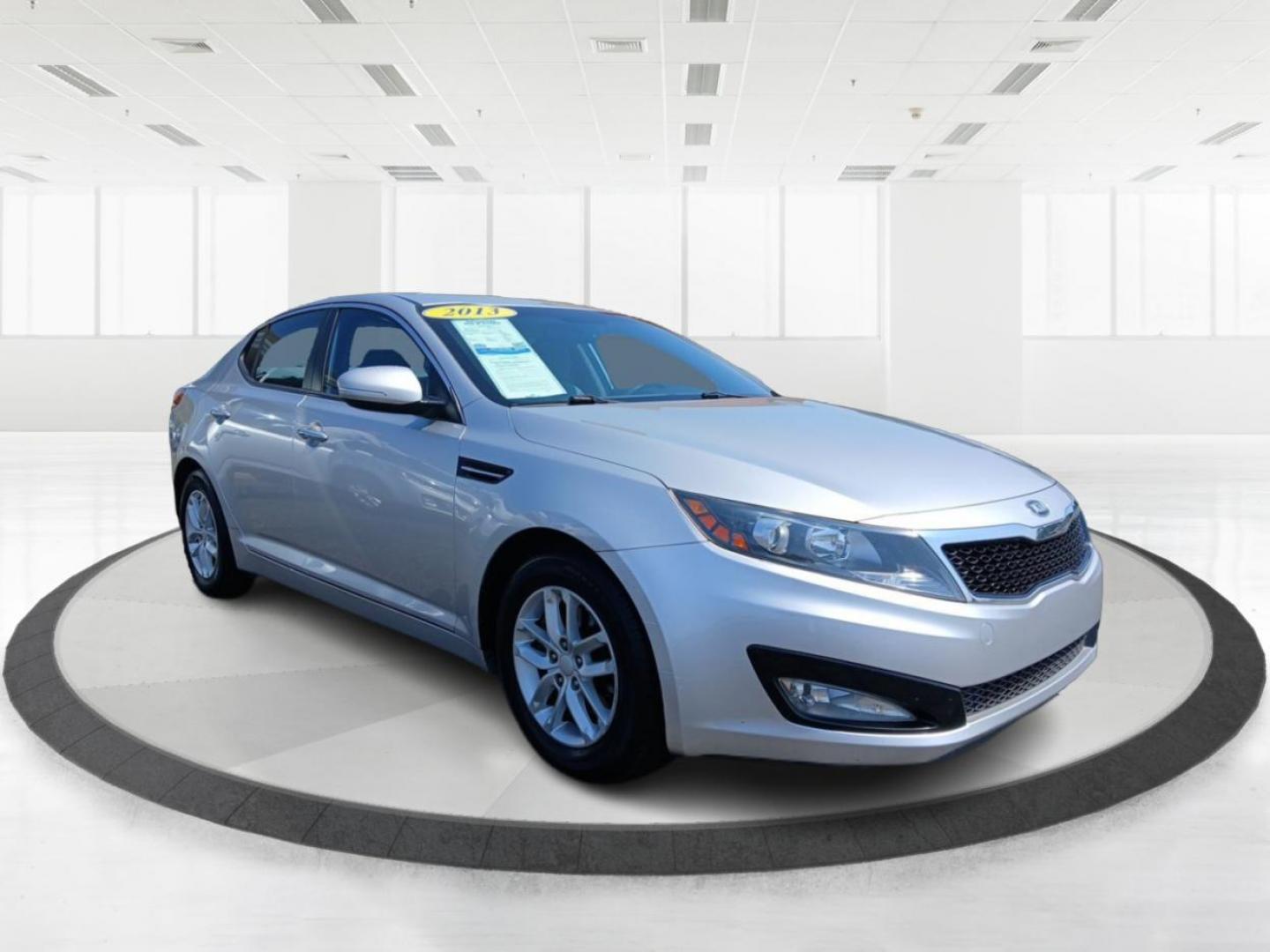 2013 Bright Silver Metallic Kia Optima LX AT (KNAGM4A78D5) with an 2.4L L4 DOHC 16V engine, 6-Speed Automatic transmission, located at 1099 N County Rd 25A, Troy, OH, 45373, (937) 908-9800, 40.057079, -84.212883 - Photo#0