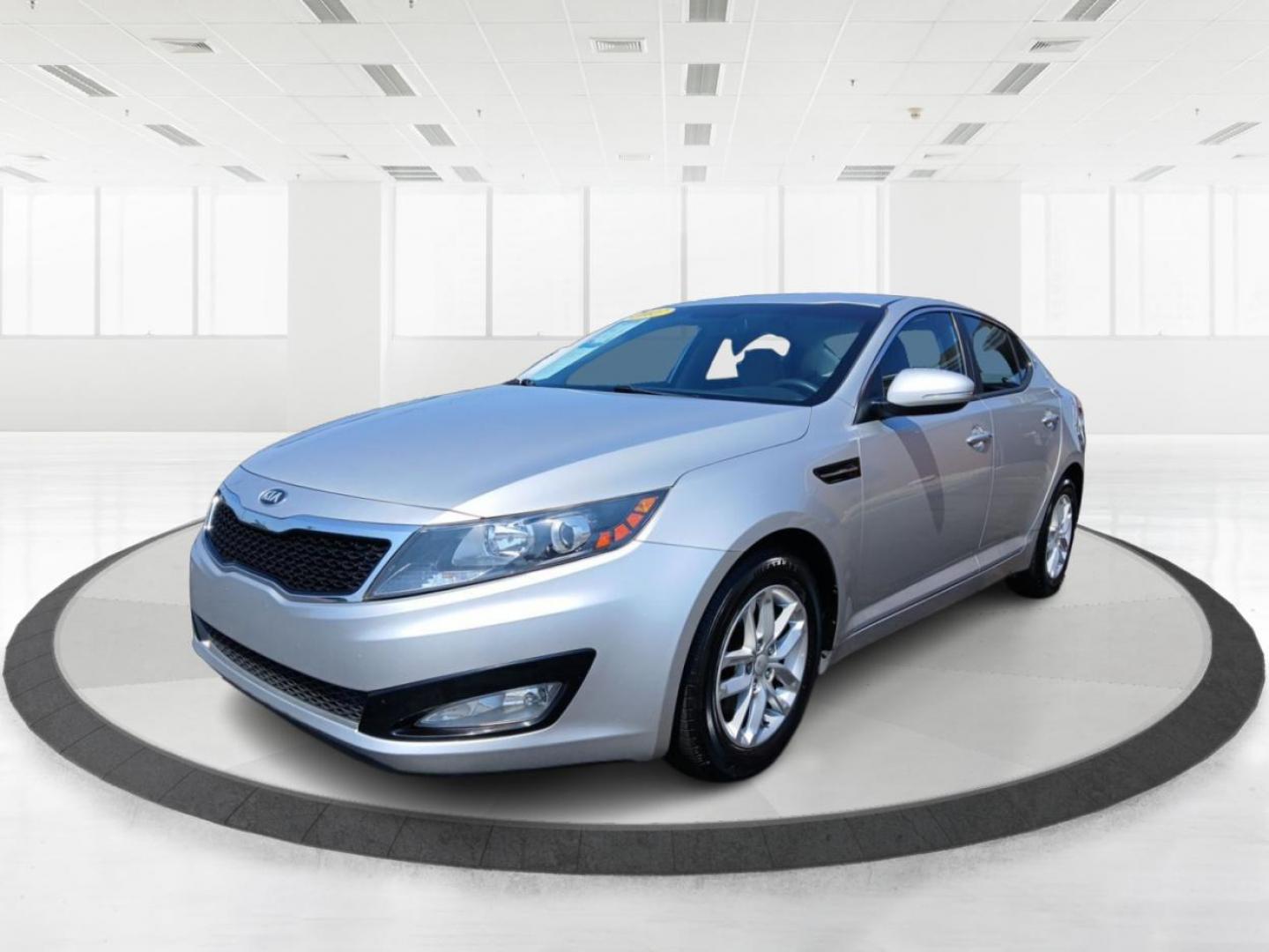 2013 Bright Silver Metallic Kia Optima LX AT (KNAGM4A78D5) with an 2.4L L4 DOHC 16V engine, 6-Speed Automatic transmission, located at 1099 N County Rd 25A, Troy, OH, 45373, (937) 908-9800, 40.057079, -84.212883 - Photo#7