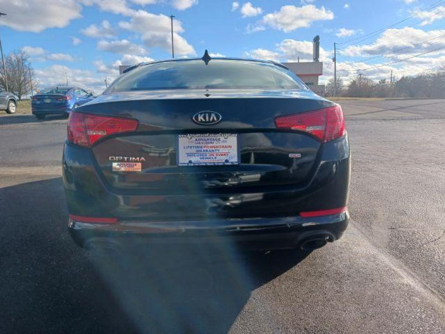 2013 Ebony Black Kia Optima LX AT (5XXGM4A73DG) with an 2.4L L4 DOHC 16V engine, 6-Speed Automatic transmission, located at 1230 East Main St, Xenia, OH, 45385, (937) 908-9800, 39.688026, -83.910172 - Photo#5