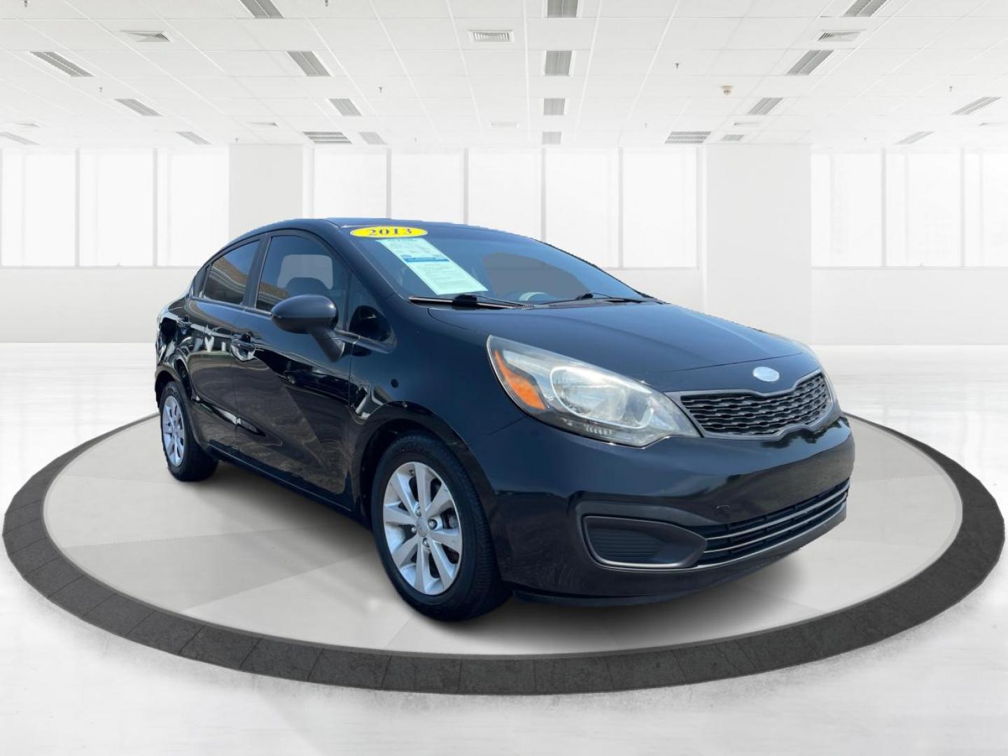 2013 Aurora Black Pearl Kia Rio LX (KNADM4A32D6) with an 1.6L L4 DOHC 16V engine, located at 1230 East Main St, Xenia, OH, 45385, (937) 908-9800, 39.688026, -83.910172 - Photo#0