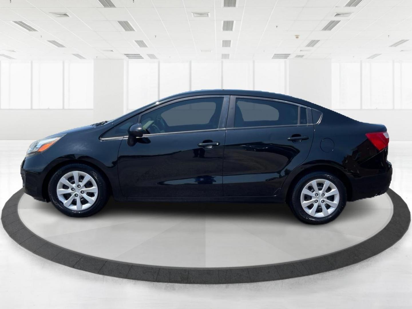 2013 Aurora Black Pearl Kia Rio (KNADM4A32D6) with an 1.6L L4 DOHC 16V engine, located at 1099 N County Rd 25A, Troy, OH, 45373, (937) 908-9800, 40.057079, -84.212883 - Photo#5