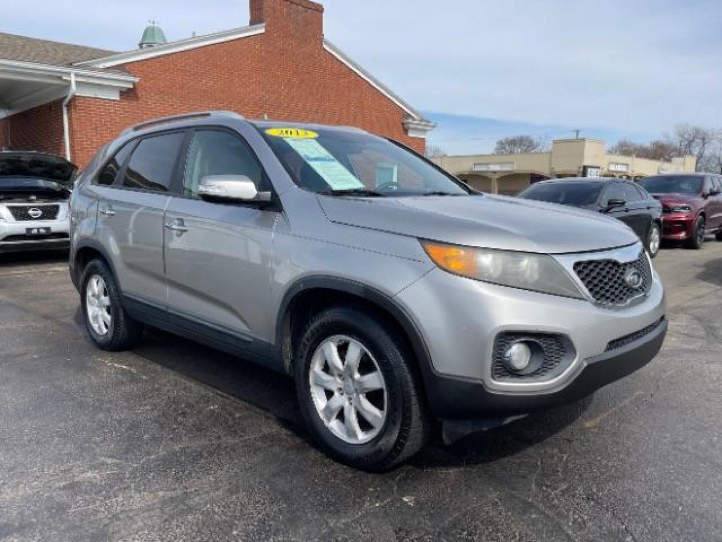 2013 Satin Metal Kia Sorento LX 2WD (5XYKT3A67DG) with an 2.4L L4 DOHC 16V engine, 6-Speed Automatic transmission, located at 1184 Kauffman Ave, Fairborn, OH, 45324, (937) 908-9800, 39.807072, -84.030914 - Photo#0