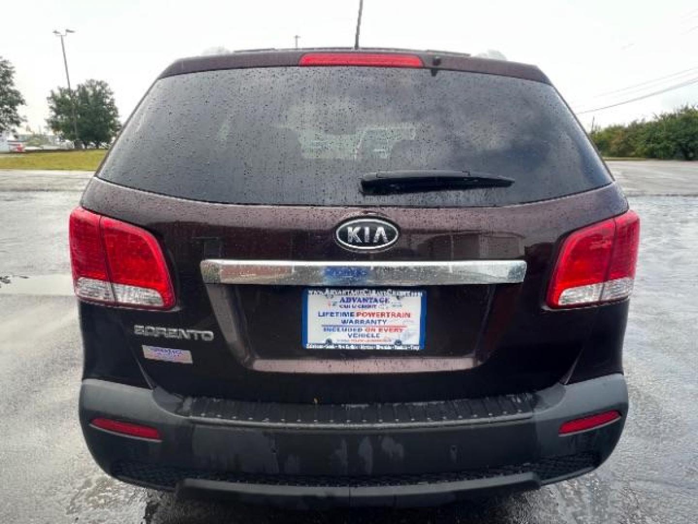 2013 Dark Cherry Kia Sorento LX 4WD (5XYKTDA67DG) with an 2.4L L4 DOHC 16V engine, 6-Speed Automatic transmission, located at 401 Woodman Dr, Riverside, OH, 45431, (937) 908-9800, 39.760899, -84.123421 - Photo#4