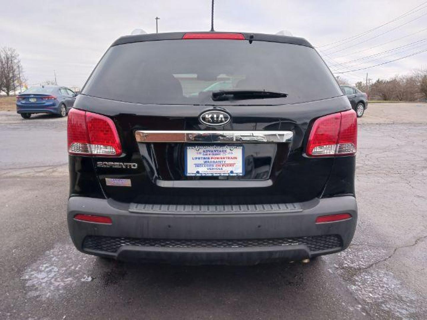 2013 Ebony Black Kia Sorento LX 2WD (5XYKT3A68DG) with an 2.4L L4 DOHC 16V engine, 6-Speed Automatic transmission, located at 401 Woodman Dr, Riverside, OH, 45431, (937) 908-9800, 39.760899, -84.123421 - Photo#5