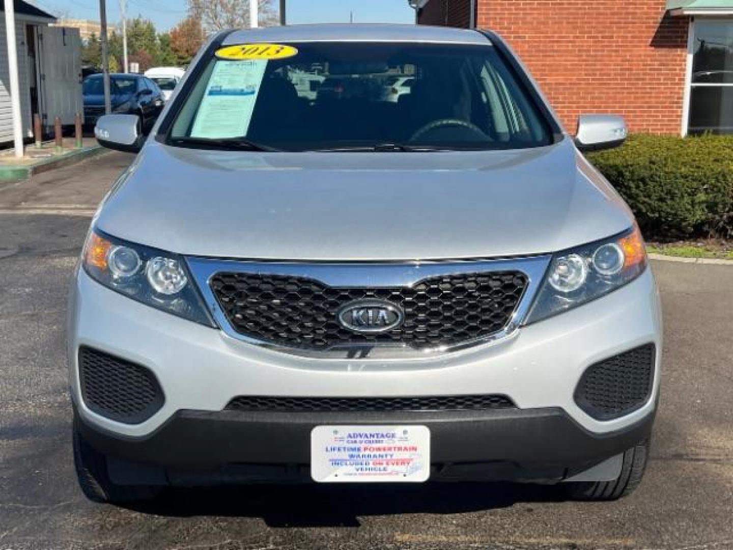 2013 Bright Silver Kia Sorento LX 2WD (5XYKT3A16DG) with an 2.4L L4 DOHC 16V engine, 6-Speed Automatic transmission, located at 1099 N County Rd 25A, Troy, OH, 45373, (937) 908-9800, 40.057079, -84.212883 - Photo#1