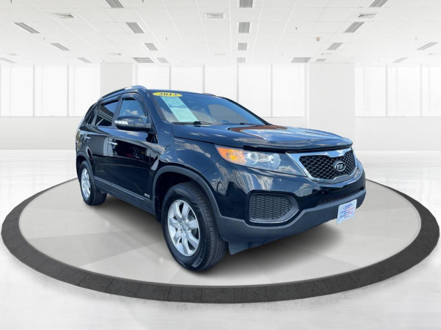 2013 Ebony Black Kia Sorento LX V6 4WD (5XYKTDA29DG) with an 3.5L V6 DOHC 24V engine, 6-Speed Automatic transmission, located at 880 E. National Road, Vandalia, OH, 45377, (937) 908-9800, 39.891918, -84.183594 - Photo#0