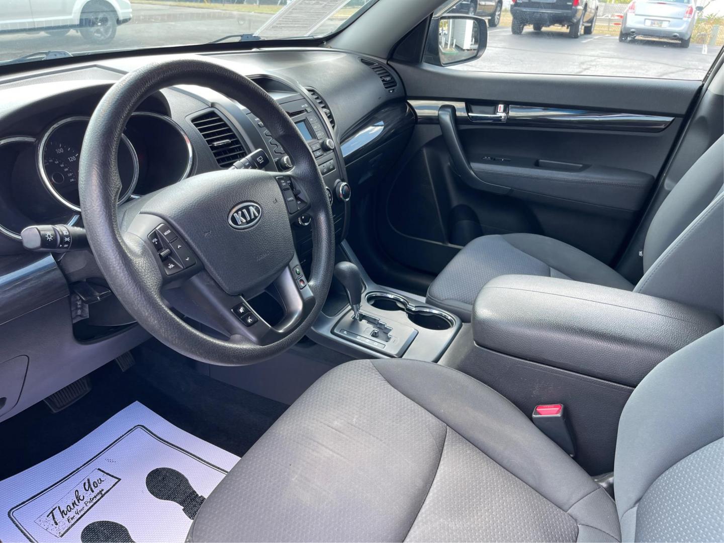 2013 Ebony Black Kia Sorento LX V6 4WD (5XYKTDA29DG) with an 3.5L V6 DOHC 24V engine, 6-Speed Automatic transmission, located at 880 E. National Road, Vandalia, OH, 45377, (937) 908-9800, 39.891918, -84.183594 - Photo#8