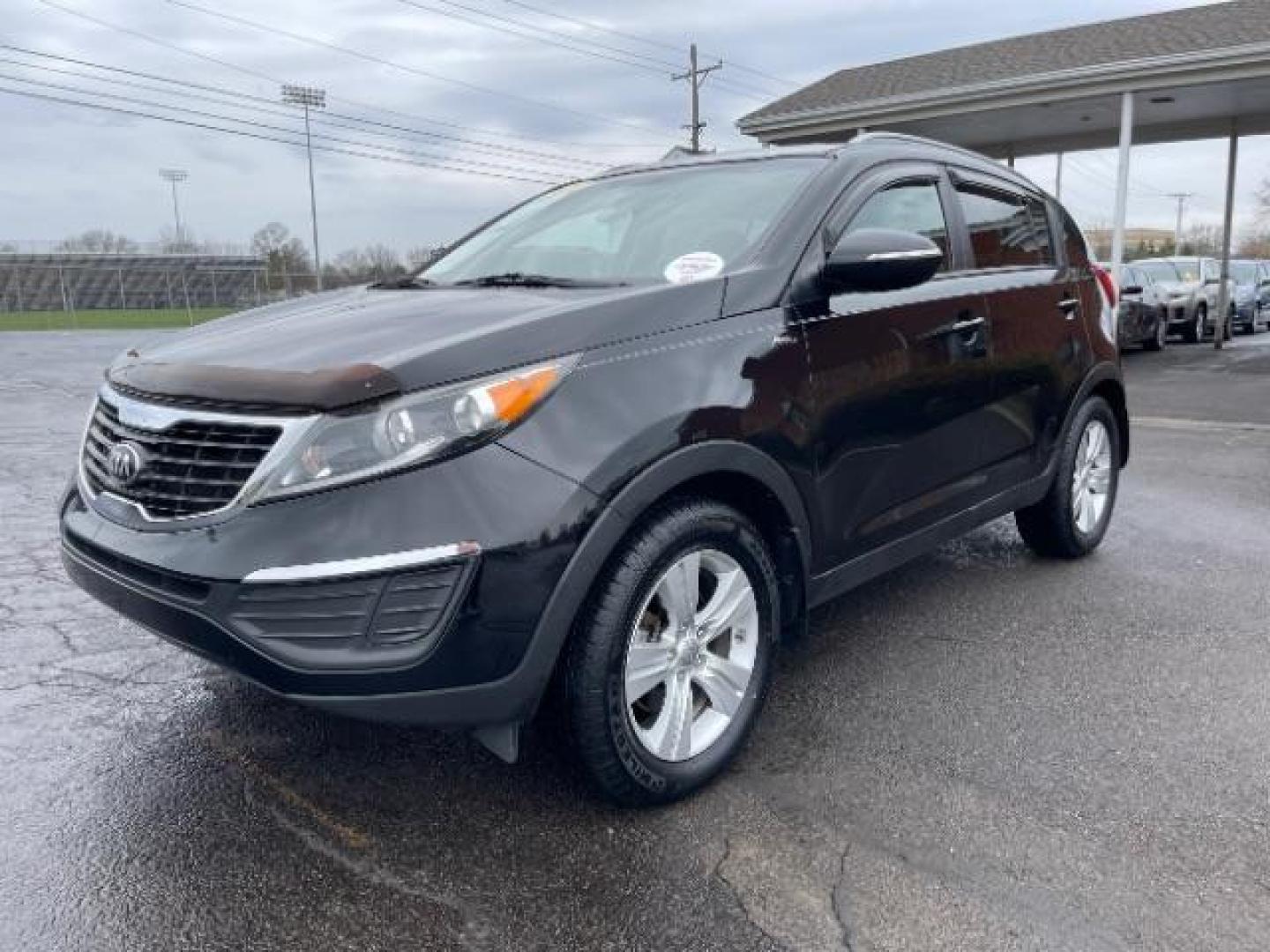 2013 Black Cherry Kia Sportage LX AWD (KNDPBCA28D7) with an 2.4L V6 DOHC 24V engine, 6-Speed Automatic transmission, located at 1184 Kauffman Ave, Fairborn, OH, 45324, (937) 908-9800, 39.807072, -84.030914 - Photo#1