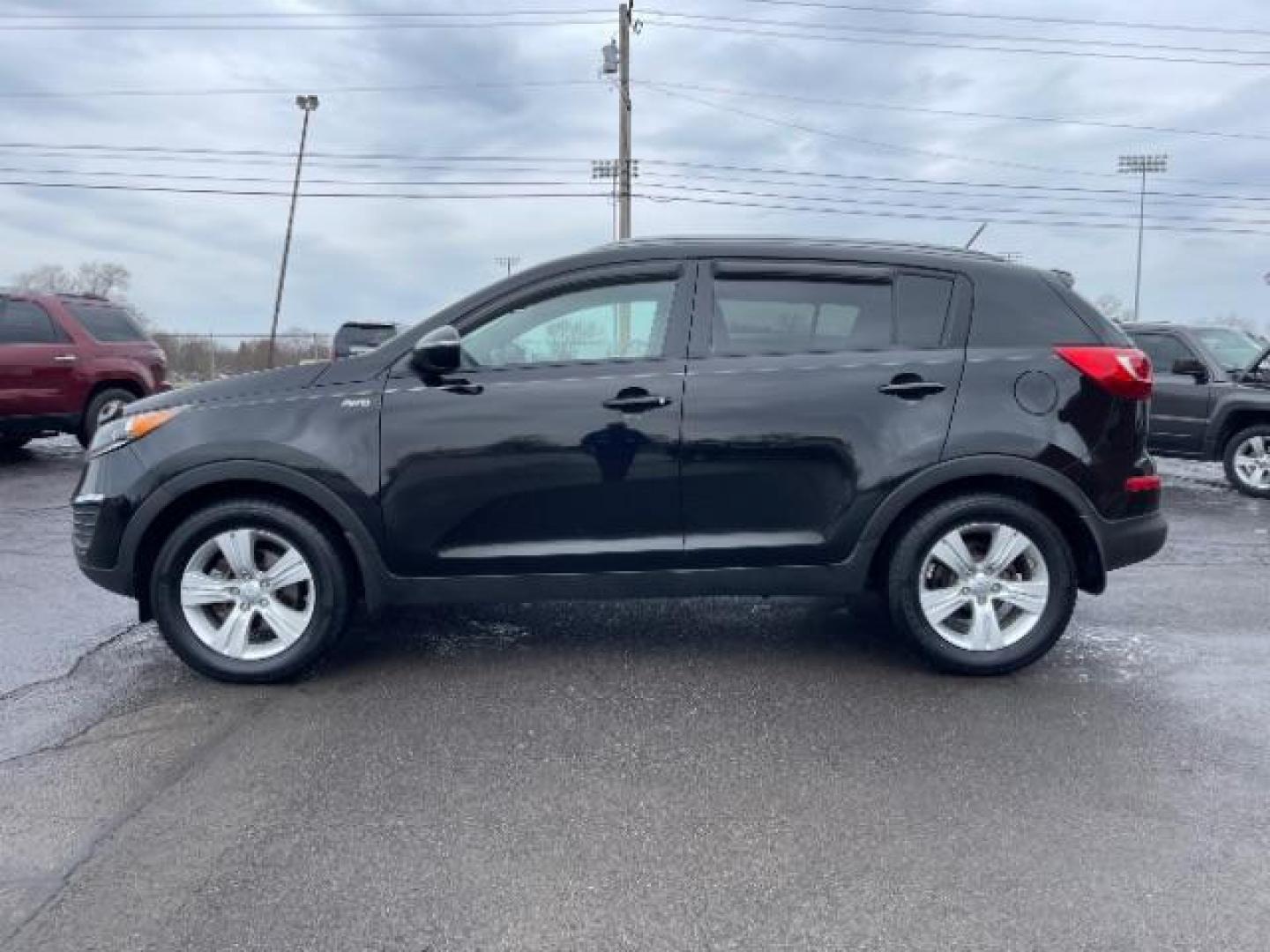 2013 Black Cherry Kia Sportage LX AWD (KNDPBCA28D7) with an 2.4L V6 DOHC 24V engine, 6-Speed Automatic transmission, located at 1184 Kauffman Ave, Fairborn, OH, 45324, (937) 908-9800, 39.807072, -84.030914 - Photo#2