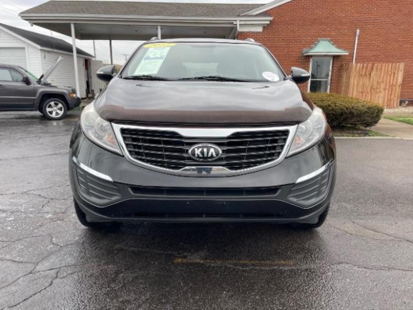 2013 Black Cherry Kia Sportage LX AWD (KNDPBCA28D7) with an 2.4L V6 DOHC 24V engine, 6-Speed Automatic transmission, located at 1184 Kauffman Ave, Fairborn, OH, 45324, (937) 908-9800, 39.807072, -84.030914 - Photo#4