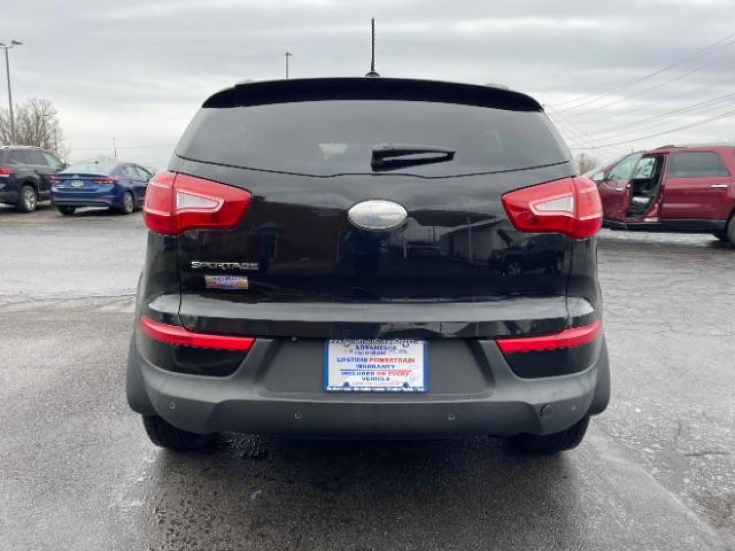 2013 Black Cherry Kia Sportage LX AWD (KNDPBCA28D7) with an 2.4L V6 DOHC 24V engine, 6-Speed Automatic transmission, located at 1184 Kauffman Ave, Fairborn, OH, 45324, (937) 908-9800, 39.807072, -84.030914 - Photo#5