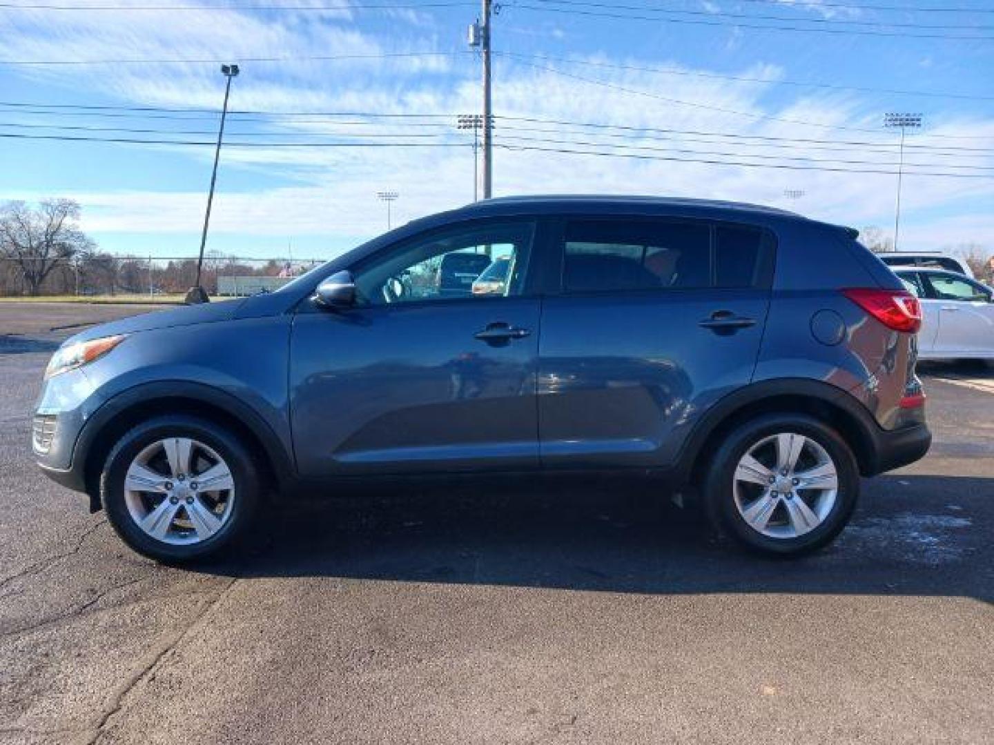 2013 Twilight Blue Kia Sportage LX FWD (KNDPB3A26D7) with an 2.4L V6 DOHC 24V engine, 6-Speed Automatic transmission, located at 1951 S Dayton Lakeview Rd., New Carlisle, OH, 45344, (937) 908-9800, 39.890999, -84.050255 - Photo#3