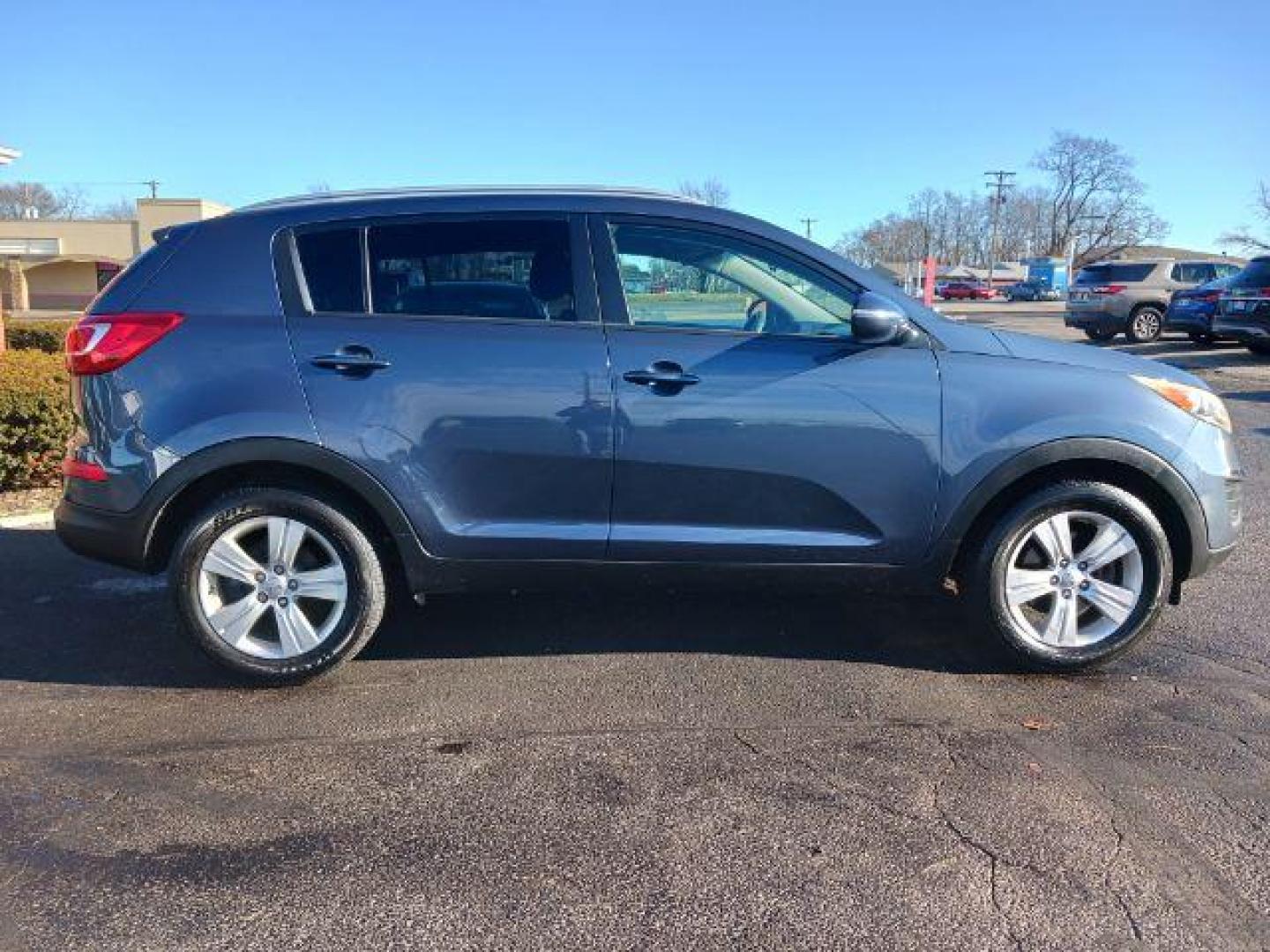 2013 Twilight Blue Kia Sportage LX FWD (KNDPB3A26D7) with an 2.4L V6 DOHC 24V engine, 6-Speed Automatic transmission, located at 1951 S Dayton Lakeview Rd., New Carlisle, OH, 45344, (937) 908-9800, 39.890999, -84.050255 - Photo#4