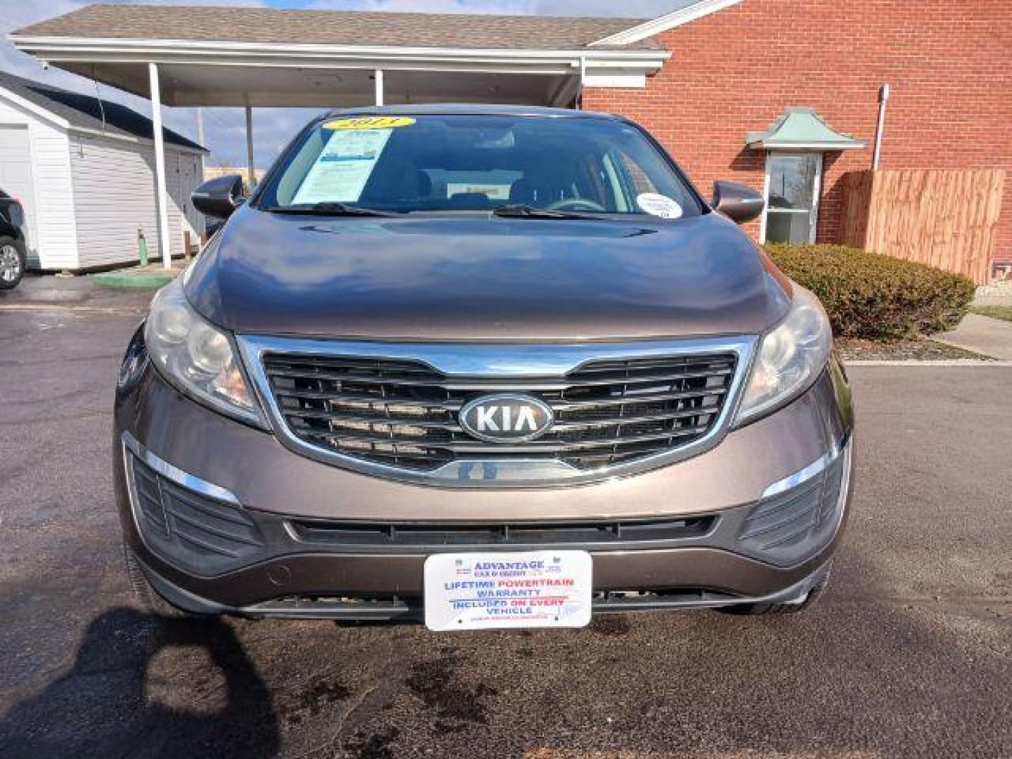 2013 Sand Track Kia Sportage LX AWD (KNDPBCA21D7) with an 2.4L V6 DOHC 24V engine, 6-Speed Automatic transmission, located at 880 E. National Road, Vandalia, OH, 45377, (937) 908-9800, 39.891918, -84.183594 - Photo#1