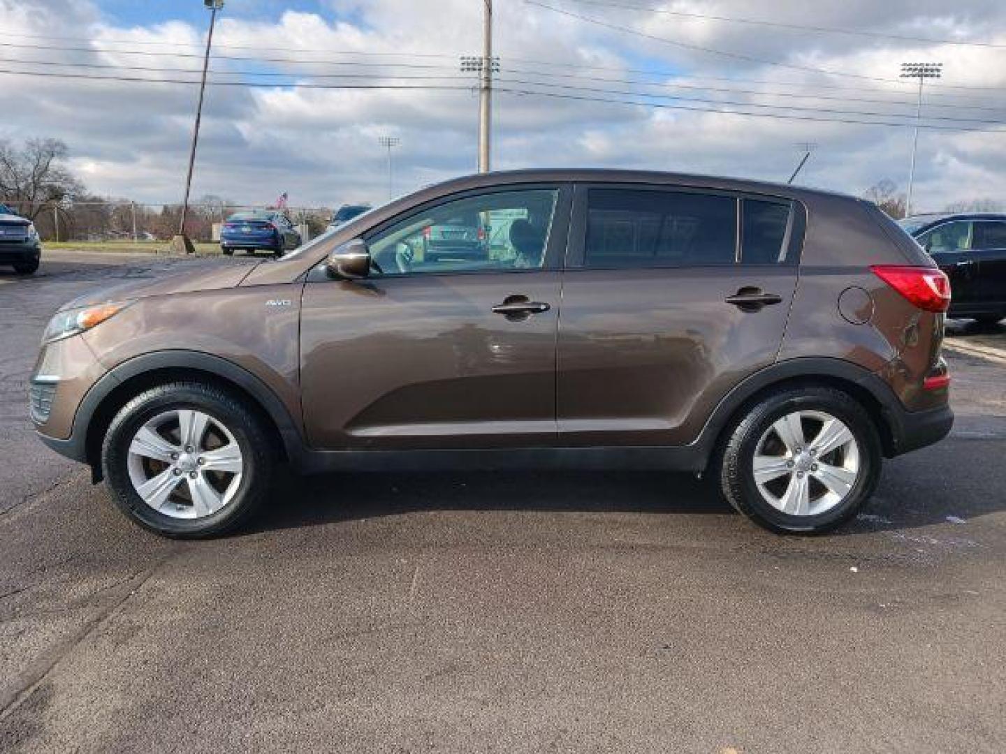 2013 Sand Track Kia Sportage LX AWD (KNDPBCA21D7) with an 2.4L V6 DOHC 24V engine, 6-Speed Automatic transmission, located at 880 E. National Road, Vandalia, OH, 45377, (937) 908-9800, 39.891918, -84.183594 - Photo#3