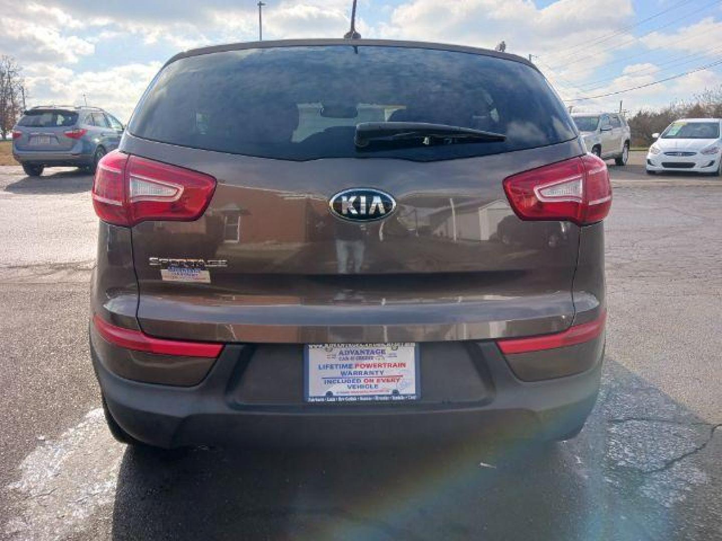 2013 Sand Track Kia Sportage LX AWD (KNDPBCA21D7) with an 2.4L V6 DOHC 24V engine, 6-Speed Automatic transmission, located at 880 E. National Road, Vandalia, OH, 45377, (937) 908-9800, 39.891918, -84.183594 - Photo#5